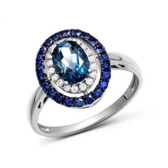 Anello moderno per lei con diamante Topazio e zaffiro blu in oro bianco 14k