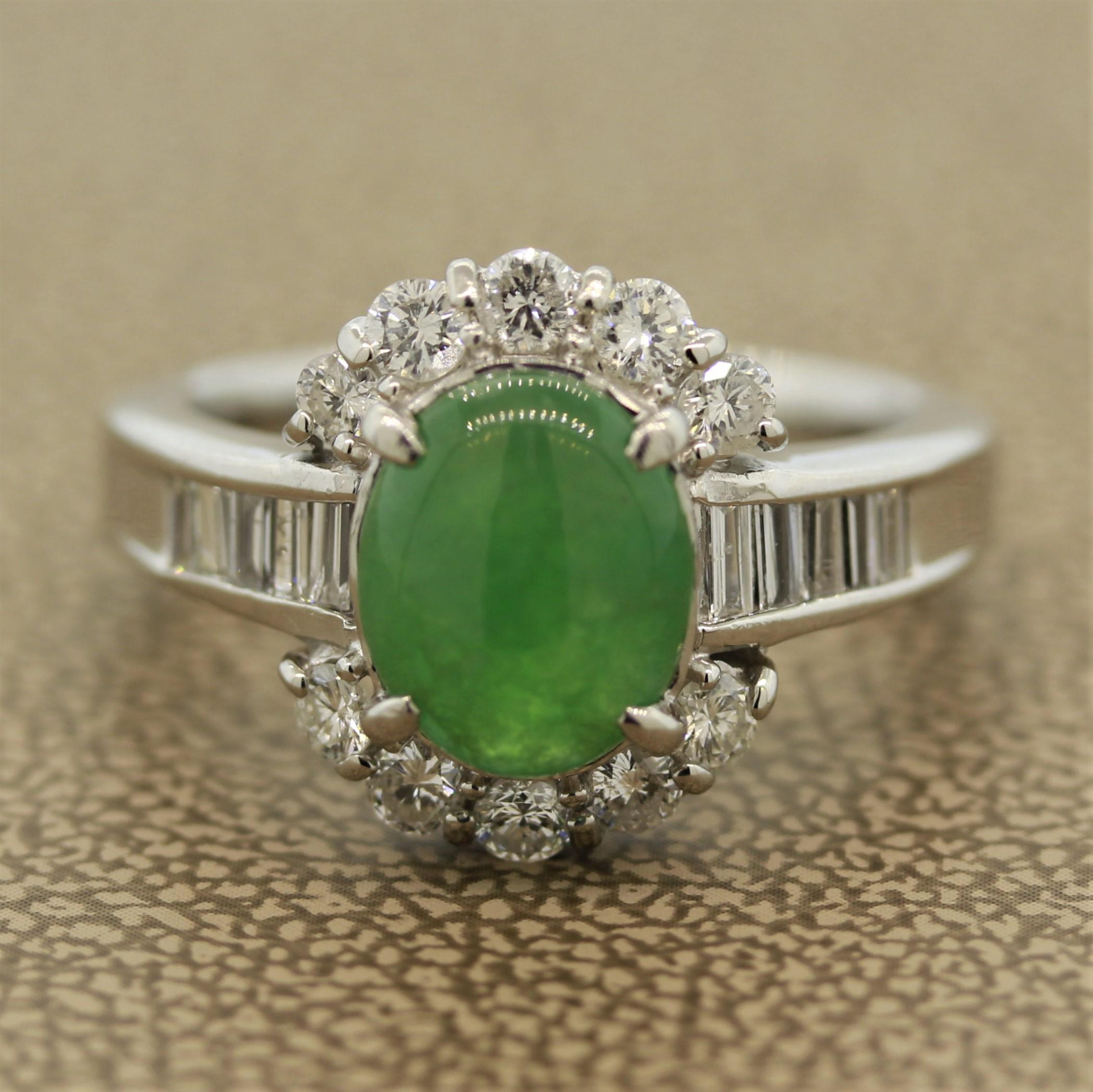 A natural Jadeite Jade ring set in a hand fabricated platinum mounting that can be worn every day. The jade weighs 2.04 carats and is completed by 0.80 carats of round brilliant and baguette cut diamonds that run down the shoulder of the ring.