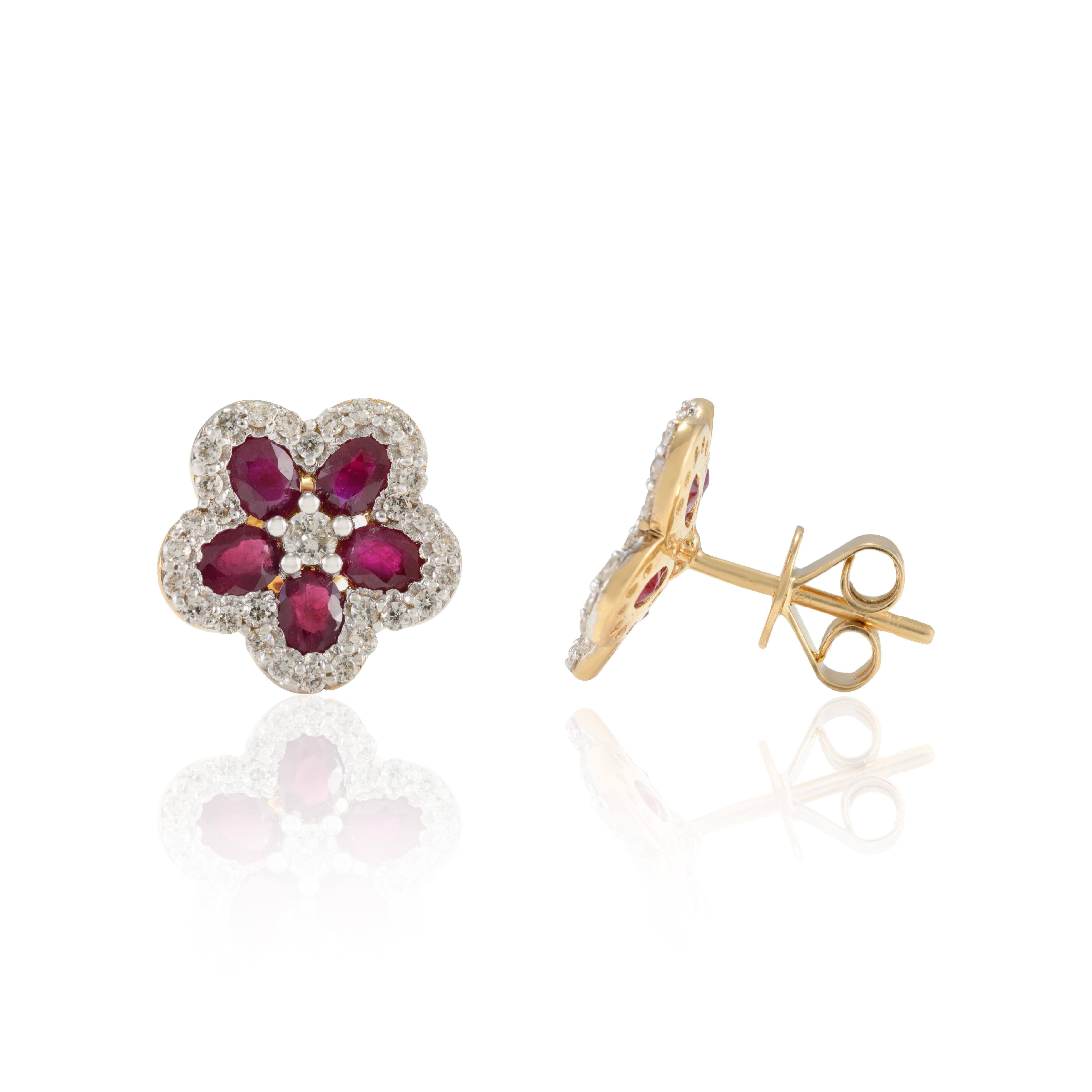 Everyday Ruby and Diamond Cherry Blossom Flower Stud Earrings in 18K Gold to make a statement with your look. You shall need stud earrings to make a statement with your look. These earrings create a sparkling, luxurious look featuring oval cut ruby