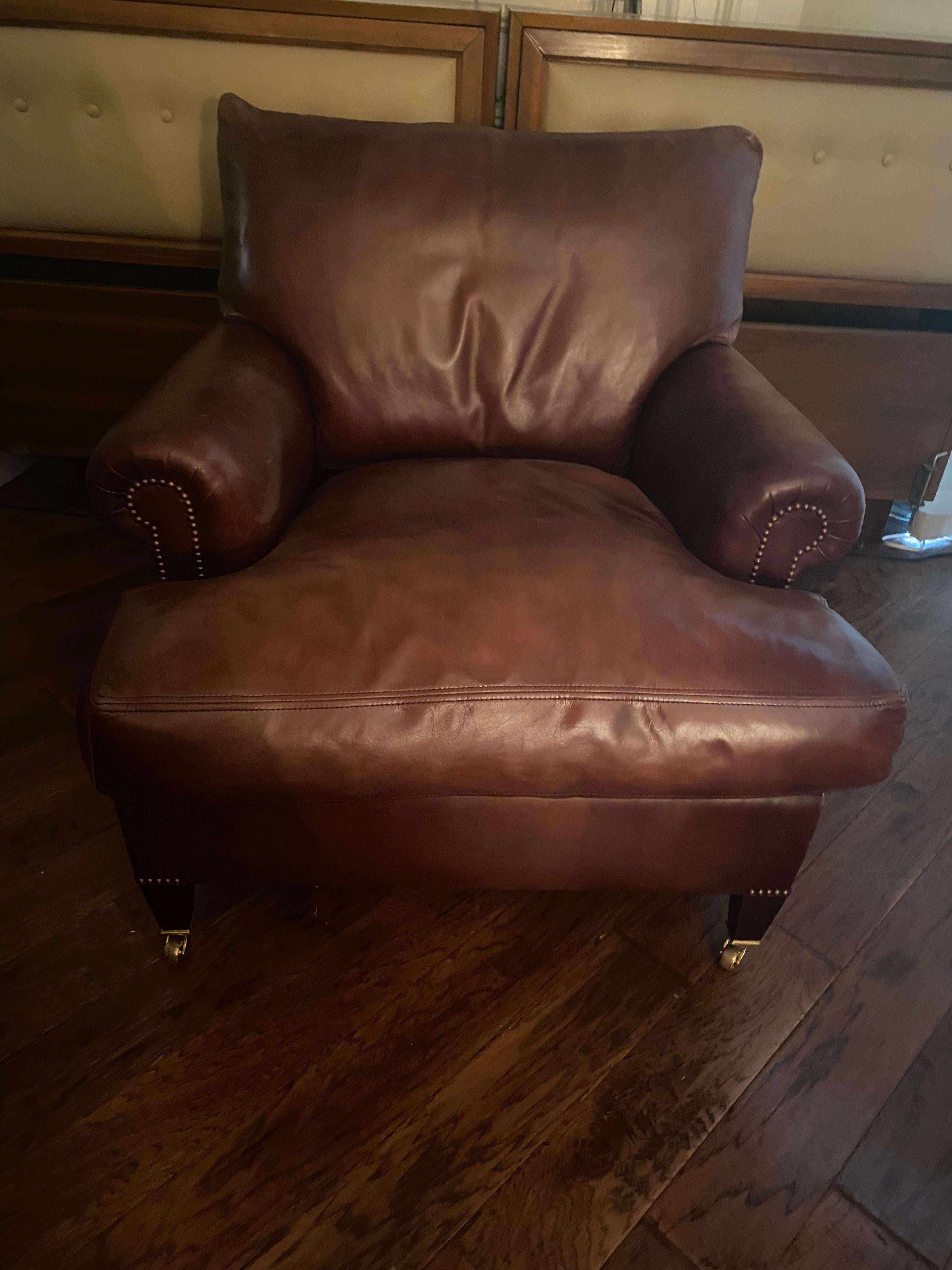 Big comfy George Smith designer chocolately leather club chair with brass nailhead detailing and mahogany legs.  Cushions are down filled.
24” arm height 
35” arm to arm width 
23” seat height 
22” (inside) arm to arm 
31” height of back (not
