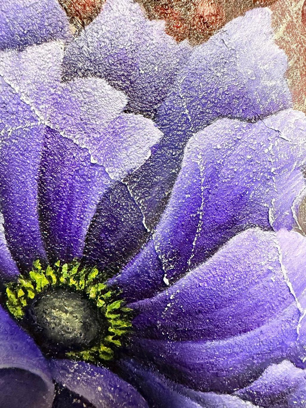 an antique-style fresco: blue flowers on a cracked, textured wall with subtle wear and ornamental details, evoking an ancient mural.