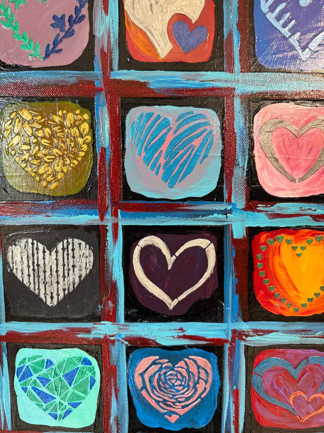 Esta vibrante obra de arte es una cuadrícula de 36 cuadrados, cada uno con un diseño de corazón distinto, que celebra la diversidad en la unidad. Los corazones varían en color, dibujo y textura, creando una sinfonía visual de arte que capta la