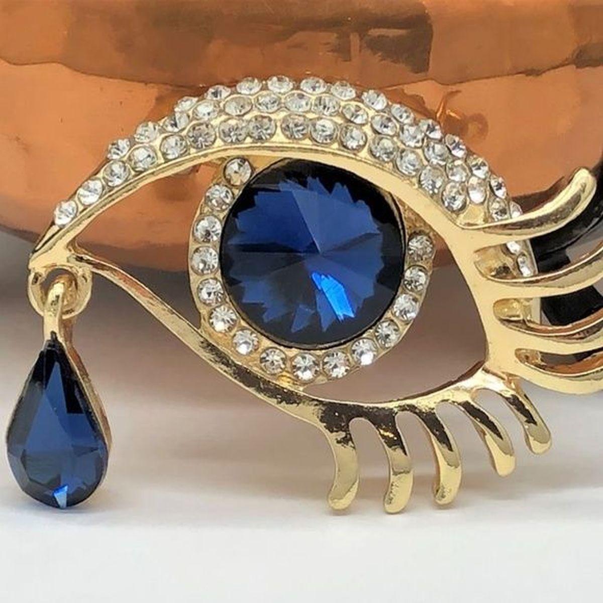 Modernista Spilla con goccia di cristallo blu e diamante con occhio maligno in vendita