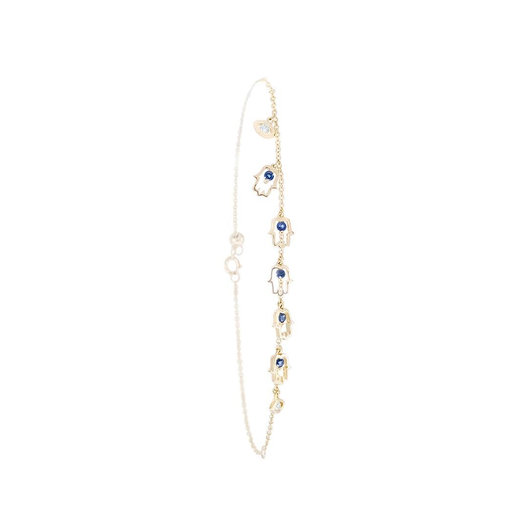14K Solid Yellow Gold Diamond Necklace (Matching Bracelet Available )

Diamond 8 RND- 0,28 ct
Blue Sapphire 3-0,16 ct
Chain
Weight 2,19

With a heritage of ancient fine Swiss jewelry traditions, NATKINA is a Geneva based jewellery brand, which