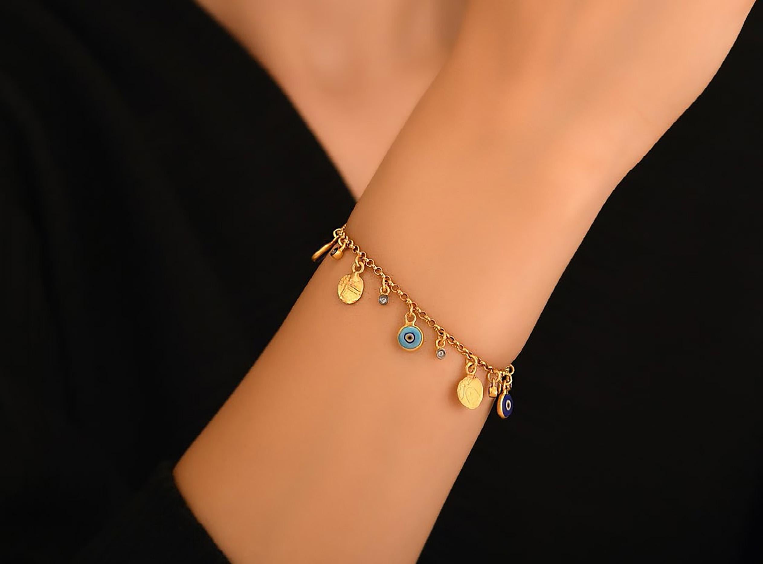 Evil Eye Bracelet, with diamond detail, 24K gold, sterling silver, enamel by Kurtulan Jewellery of Istanbul, Turkey.  This piece is made to order and will take approximately 4-6 weeks for delivery.

About Kurtulan:
Kurtulan jewellery manufacturing