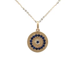 Collier pendentif saphir diamant œil maléfique 0.28 carats or jaune 14 carats
