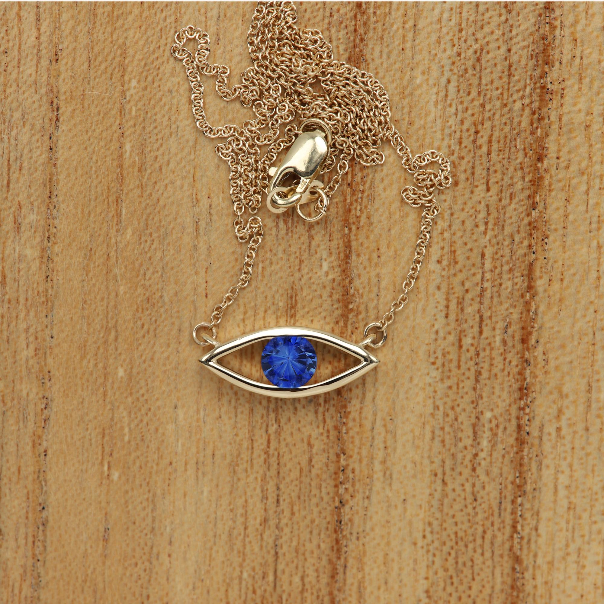 sapphire evil eye pendant