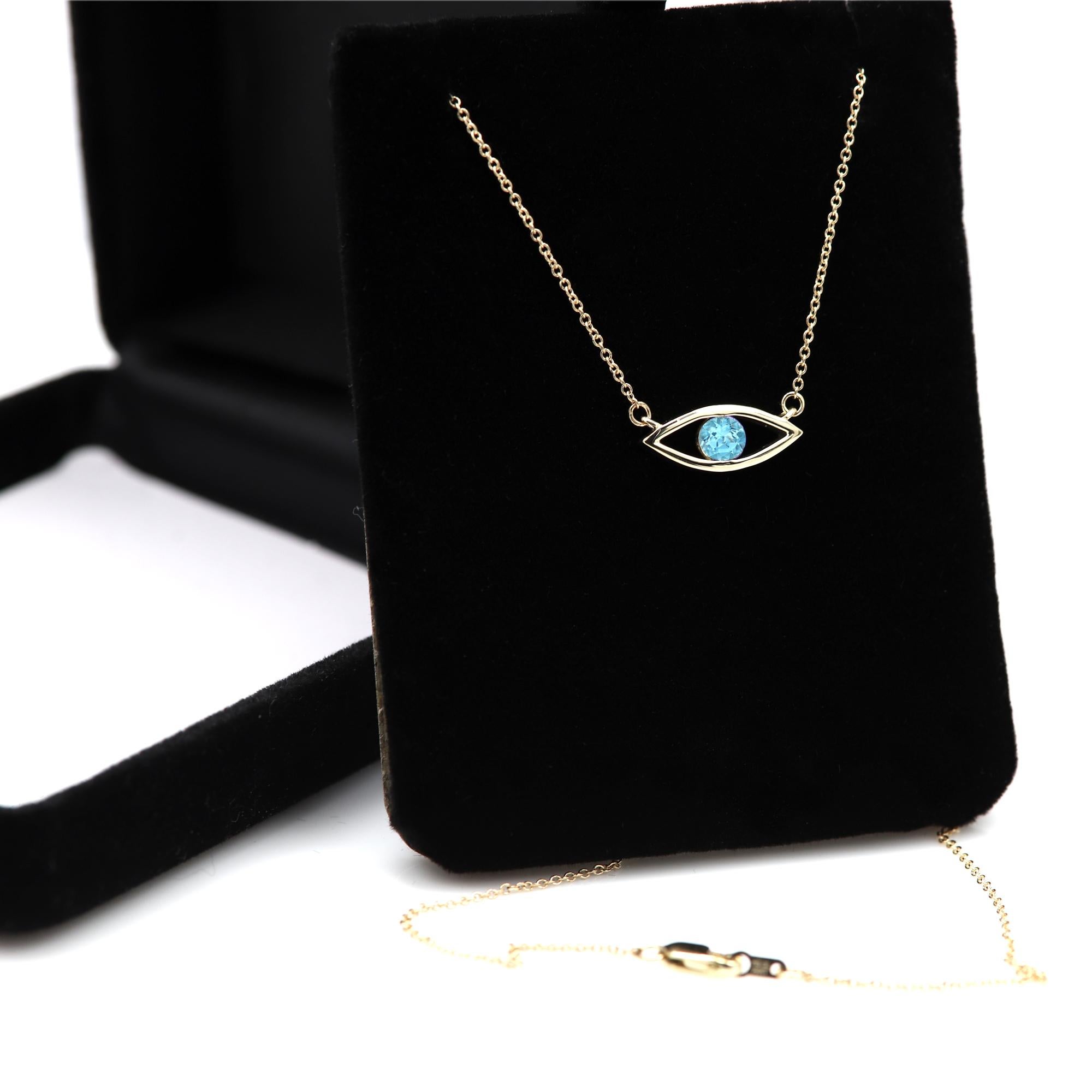 blue topaz evil eye necklace