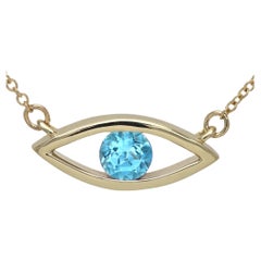 Collier Evil Eye en or jaune 14 carats avec topaze bleue et pierre de naissance de 0,50 carat 