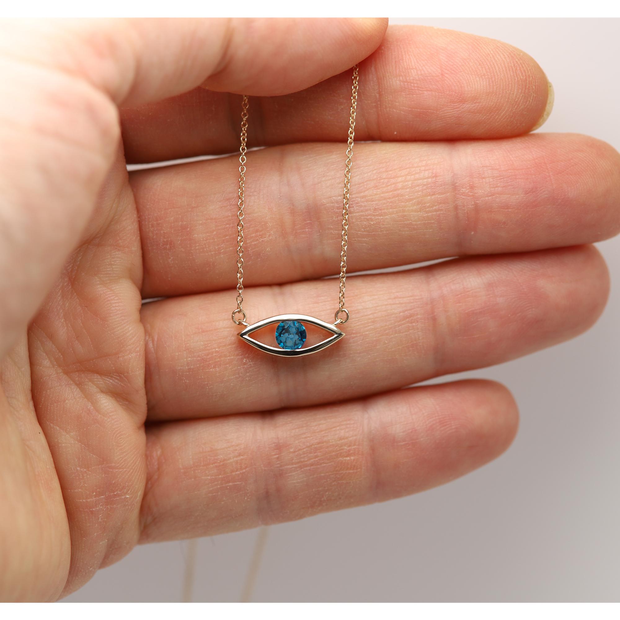 Women's Evil Eye Necklace 14 Karat Yellow Gold Lond Blue Topaz Birthstone 0.50 Carat For Sale