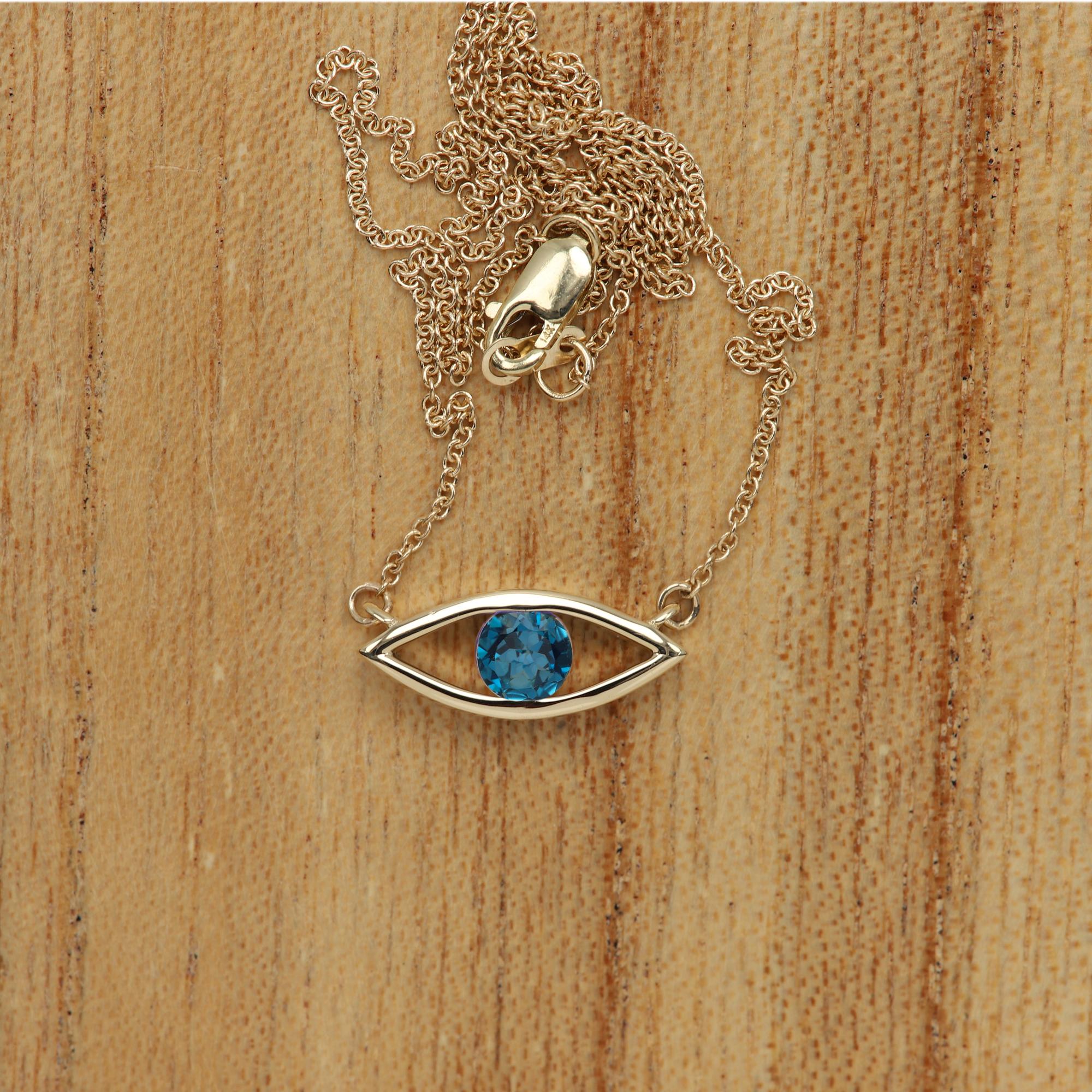 Round Cut Evil Eye Necklace 14 Karat Yellow Gold London Blue Topaz Birthstone 0.50 Carat For Sale