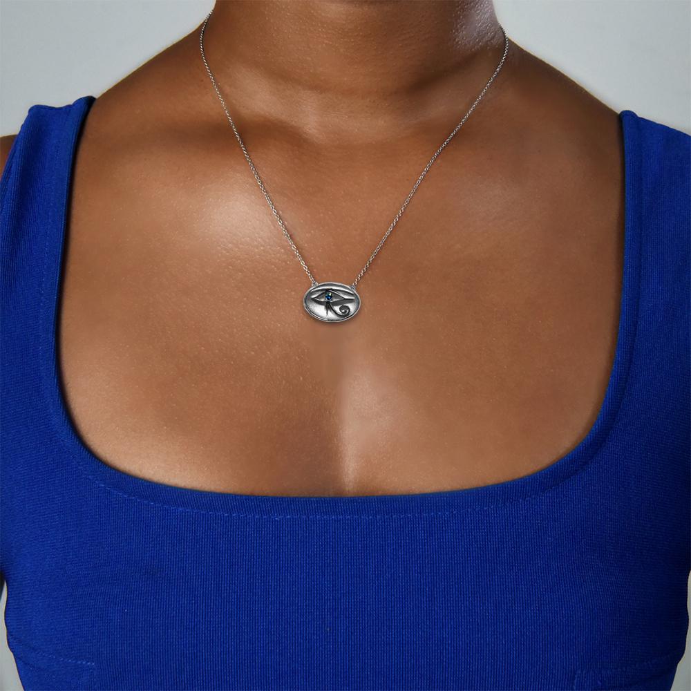 Introducing the Michael Bondanza Jewelry 925 Sterling Silver Evil Eye Pendant Necklace, a captivating blend of mystique and modernity. Crafted with precision in our Midtown New York City studio, this exquisite piece features a 925 sterling silver