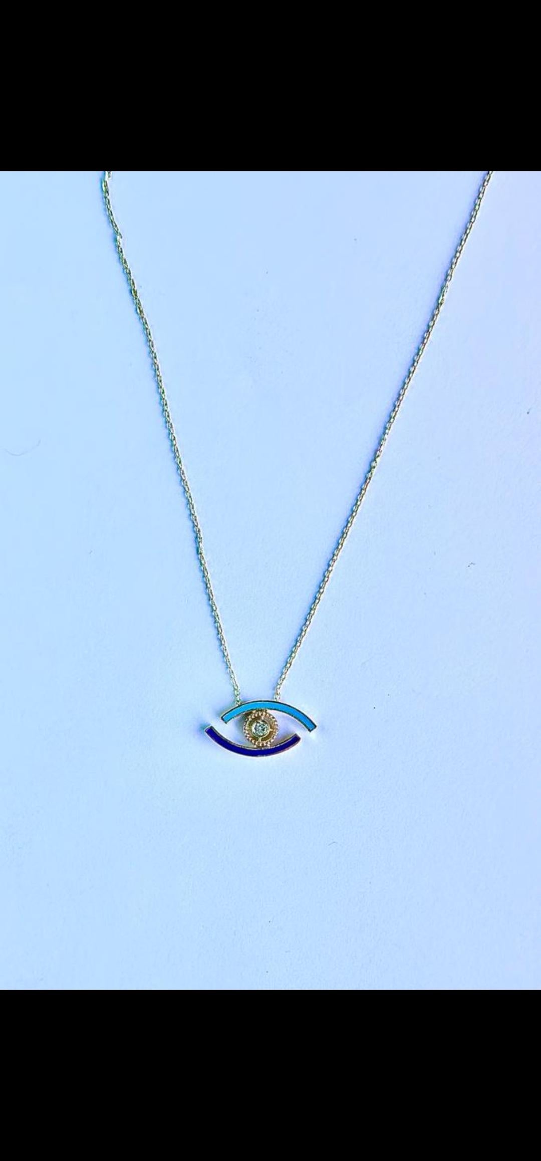 the eye necklace meaning