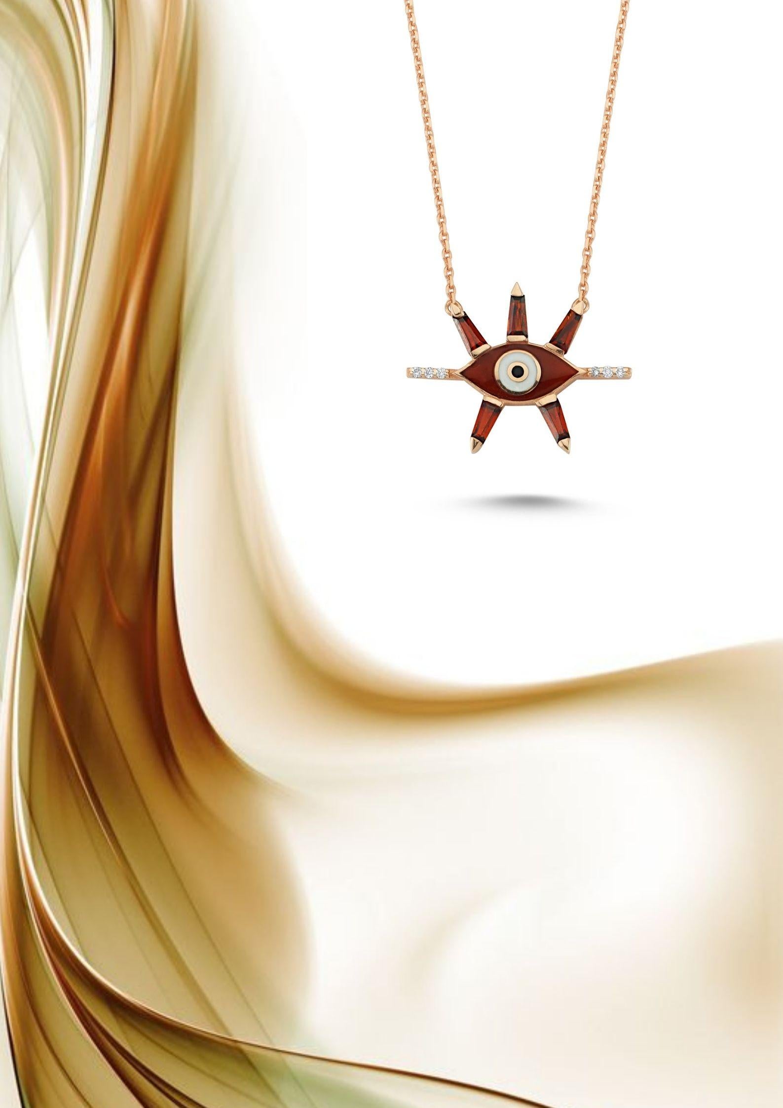 Evil eye necklace with garnet, enamel & 0.03ct white diamond by Selda Jewellery

Additional Information:-
Collection: Art of giving collection
14K Rose gold
0.03ct White diamond
Chain length 43cm
Pendant height 1.5cm