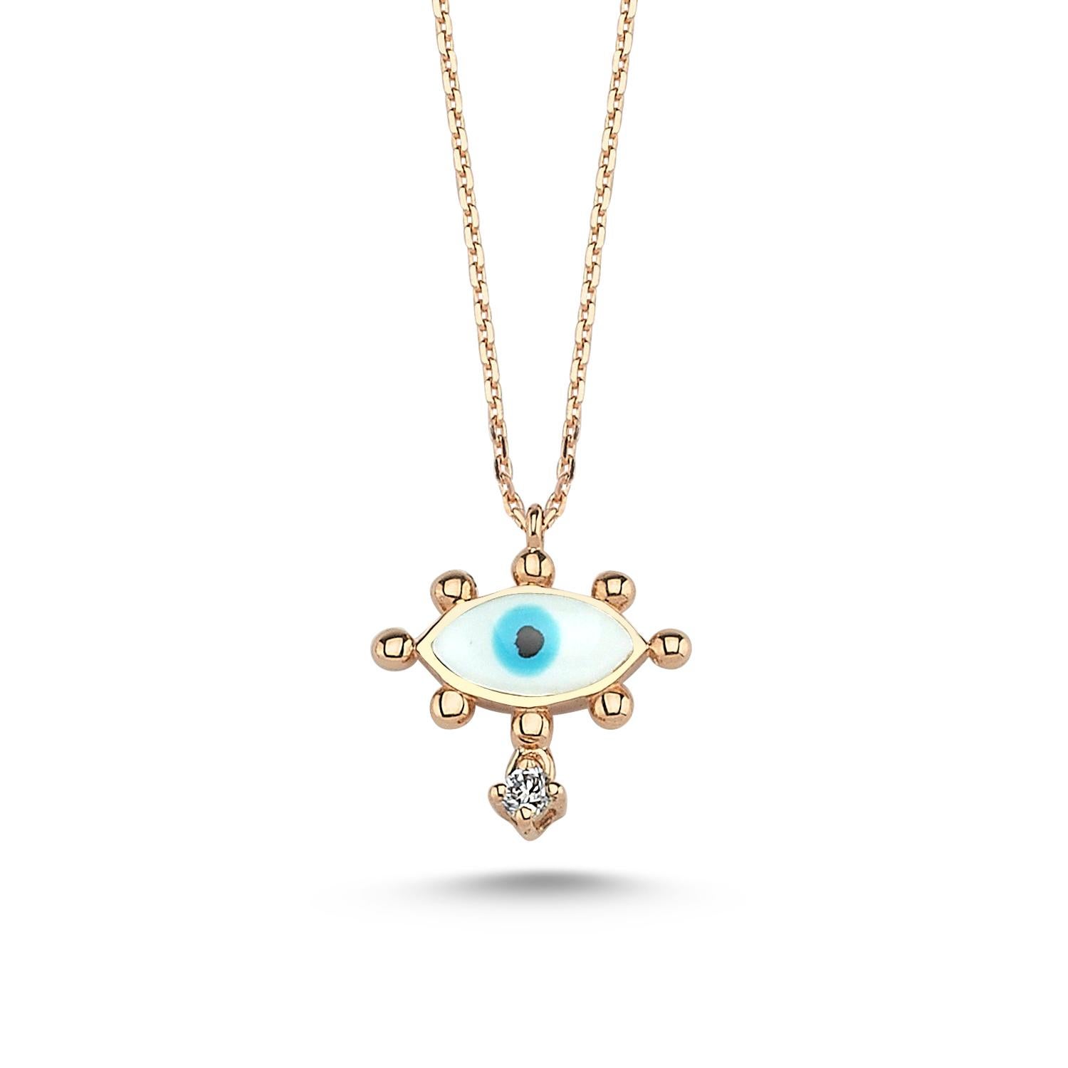 Evil eye necklace with white enamel and 0.02ct white diamond by Selda Jewellery

Additional Information:-
Collection: Art of giving collection
14K Rose gold
0.02ct White diamond
Chain length 42 cm
Pendant diameter 1 cm