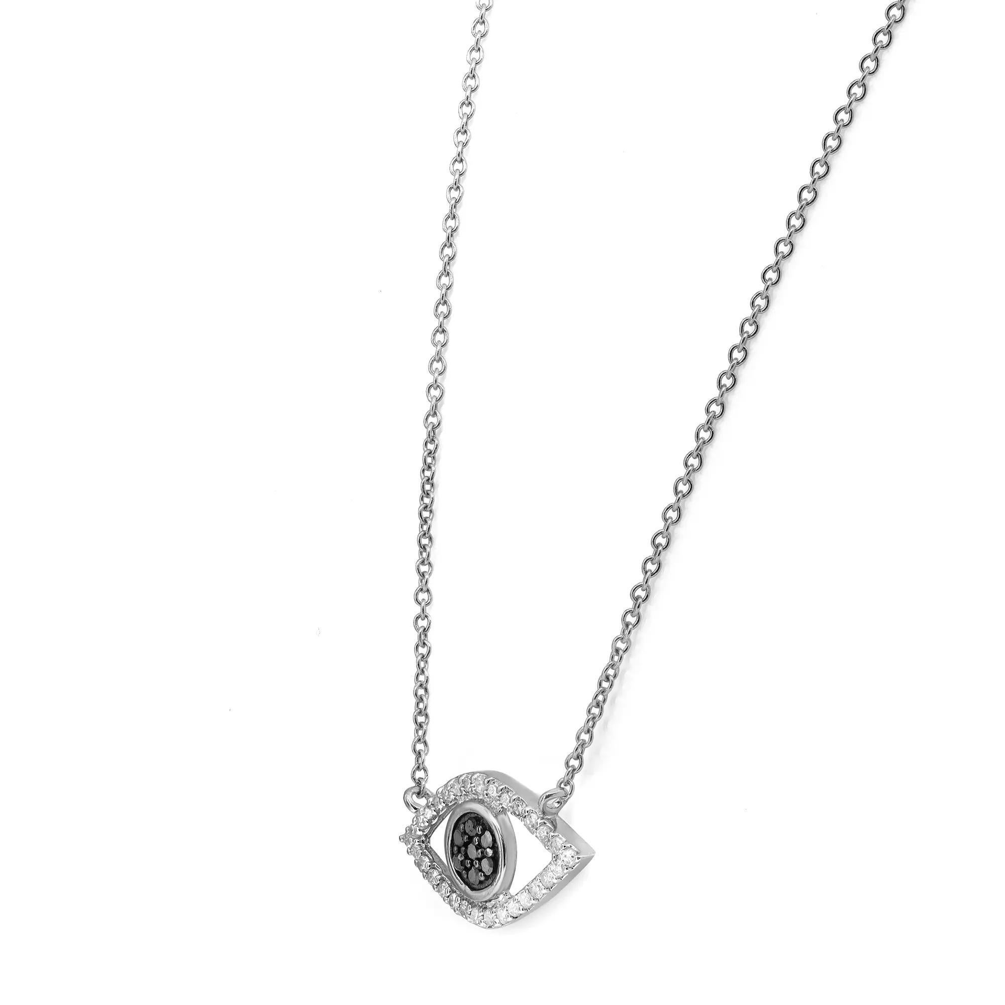 Chic, timeless, and the perfect everyday necklace. Crafted in 14k white gold. This necklace features an evil eye pendant studded with pave set black diamonds in the center round shank with white diamonds on the eye shape outline. Total diamond