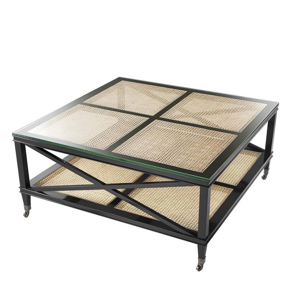 Coffee table Evora with structure in solid mahogany wood
in black lacquered finish. With natural cane. With glass top.
With antique bronze wheels.

 