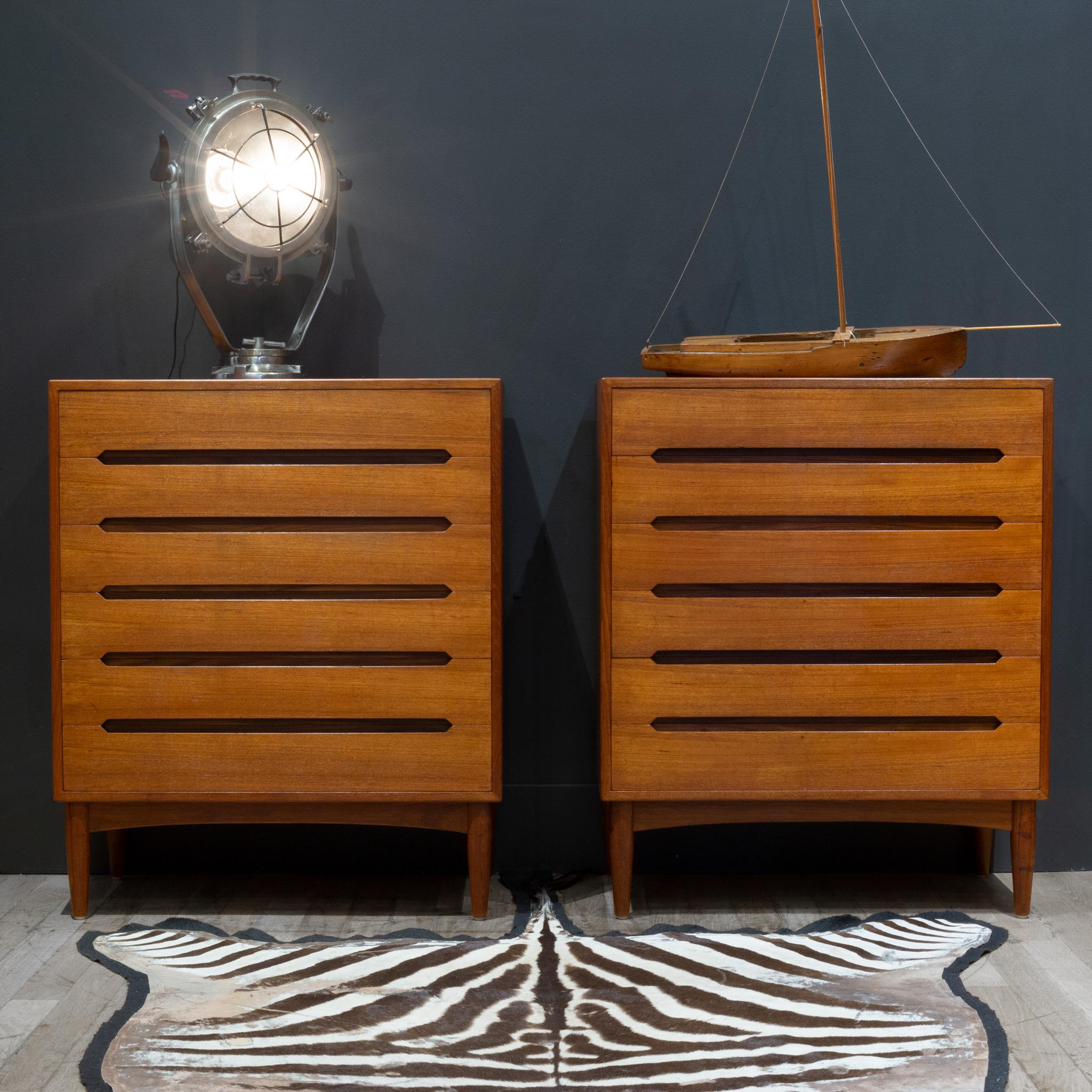ABOUT

Price per piece.

A pair of mid-century modern dressers designed and manufactured by E.W. Bach in Denmark, circa 1950s featuring six drawers with dovetailed joinery and carved pulls showcasing impeccable craftsmanship. The sturdy dressers sit