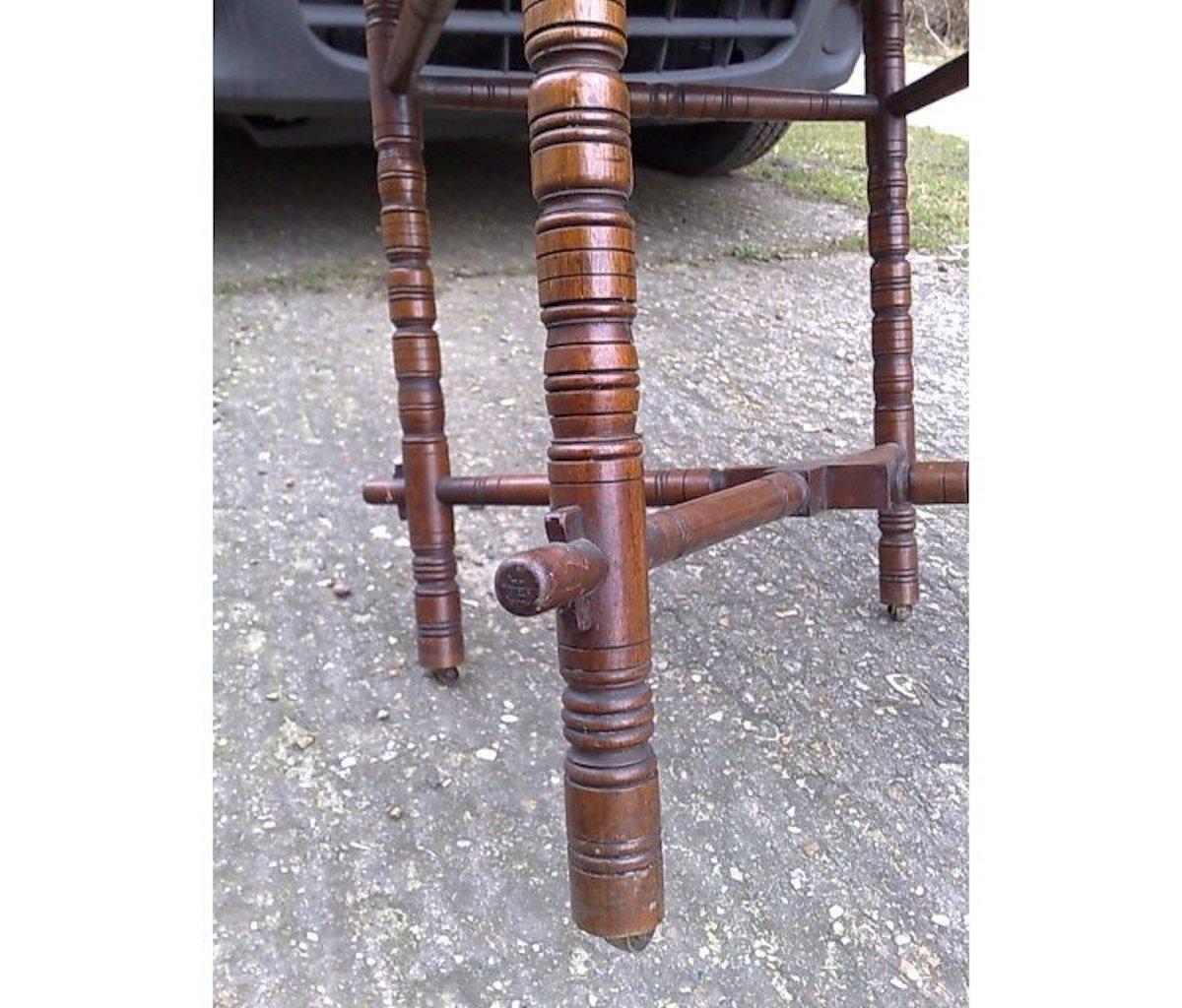 E.W. Godwin, an Aesthetic Movement Walnut Octagonal Table with Crossed Stretcher For Sale 3