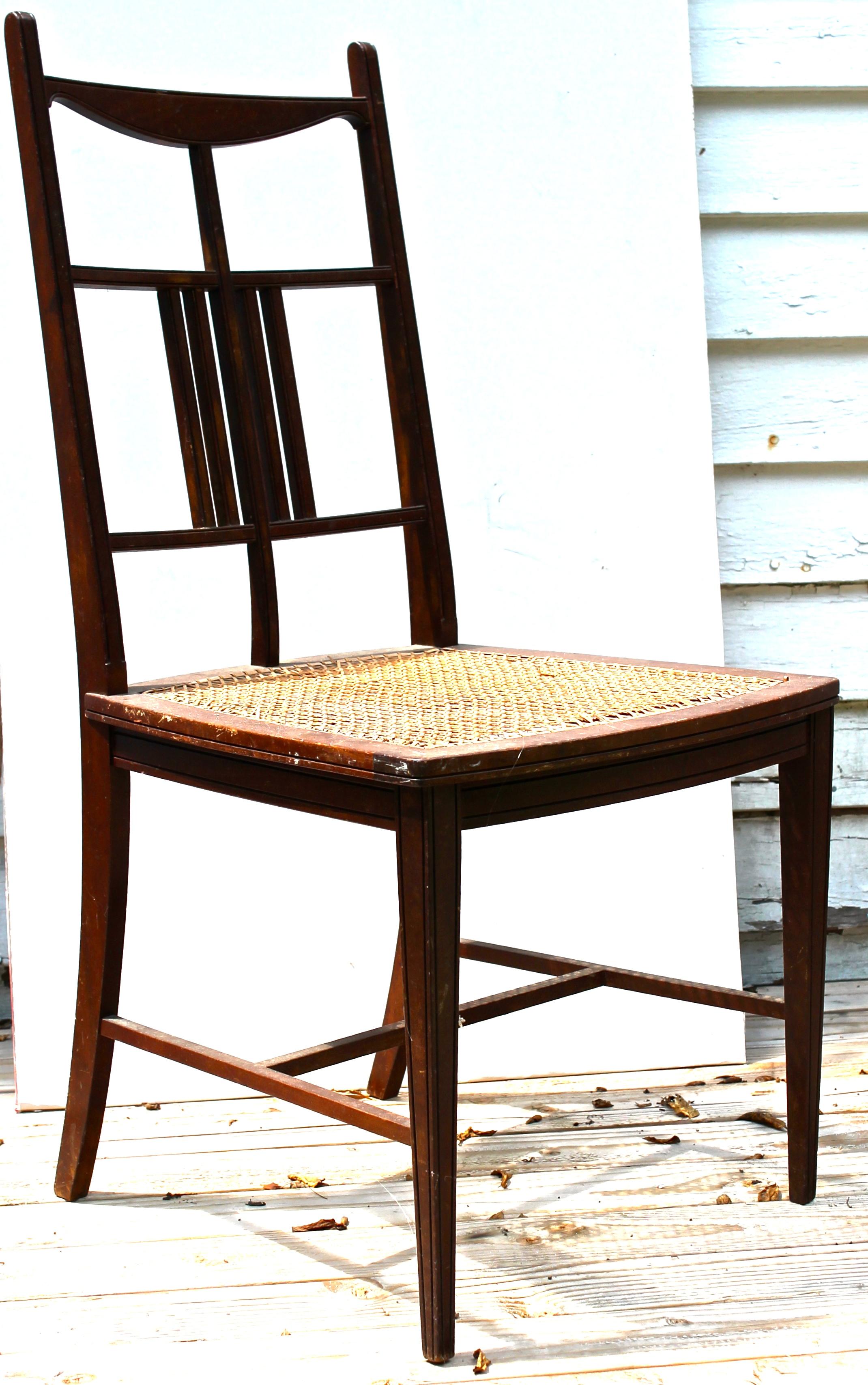 Offering a lightweight mahogany Anglo-Japanese side chair with many Godwin characteristics, and probably executed by William Watt circa 1877. Hand caned seat. Weighs less than 8 lbs.