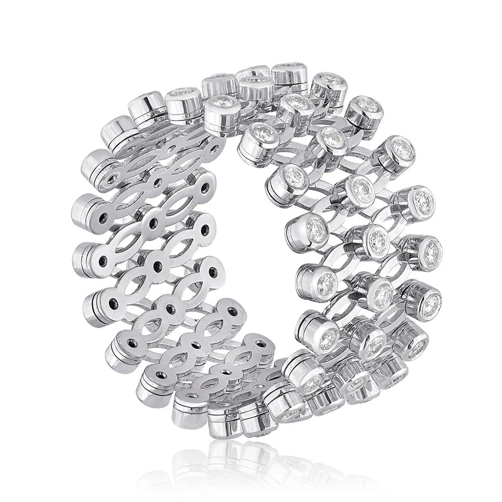 Very unusual adjustable ring
The ring is 18K White Gold
There are 1.30 Carats in Diamonds D VVS
The designer E.W. Schreiber KG made in Germany
The ring adjusts from size 6 to as large as 15
The band is 9/16