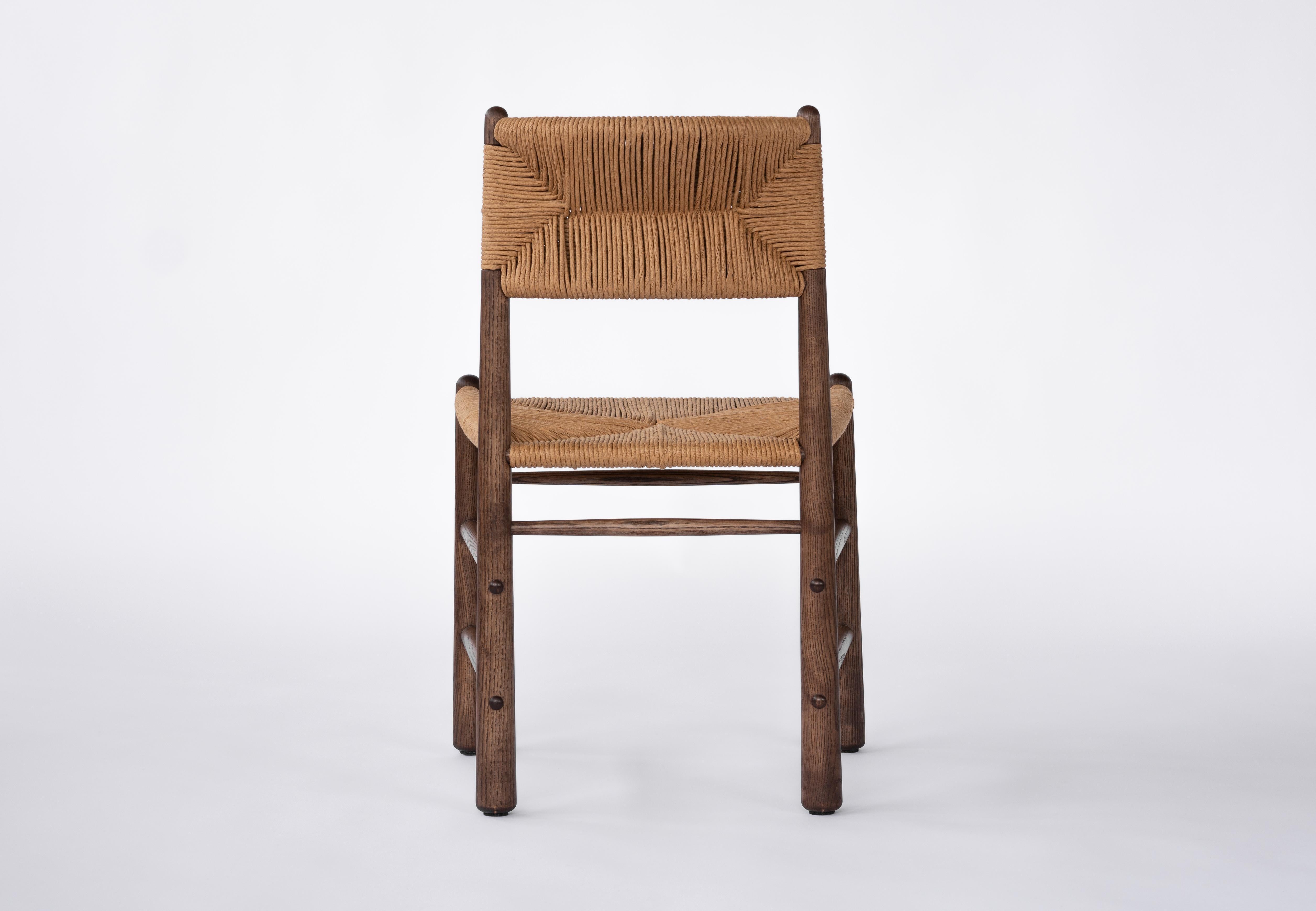 This updated nod to a classic adds bucolic spirit and rich texture to any dining setting. Exploring time-honored craft traditions, the Ewa dining chair features a handwoven seat and backrest in natural fibre rush.

Handmade in Hamilton,