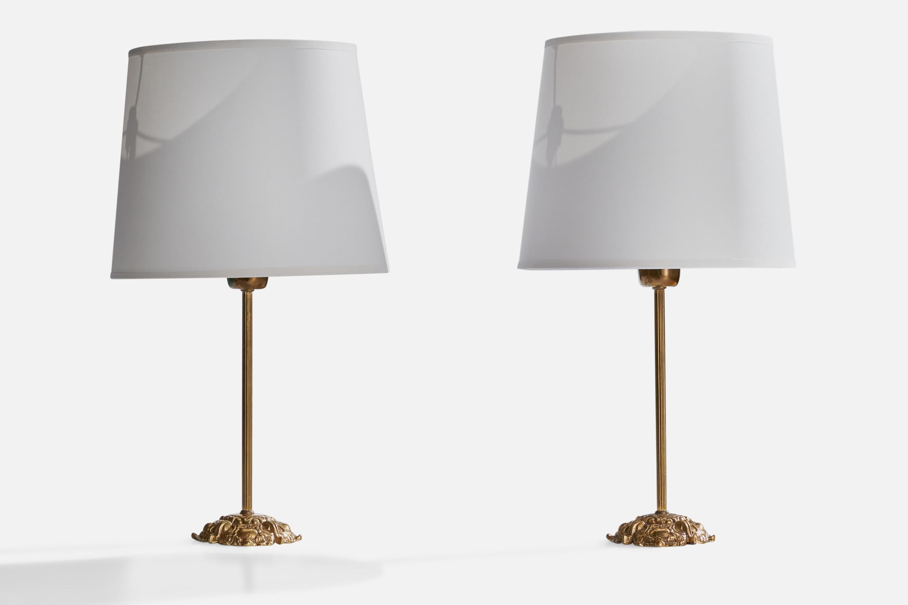 A pair of brass table lamps designed and produced by EWÅ Värnamo, Sweden, 1960s.

Dimensions of Lamp (inches): 12.25” H x 4” Diameter
Dimensions of Shade (inches): 8”  Top Diameter x 10” Bottom Diameter x 8” H
Dimensions of Lamp with Shade (inches):