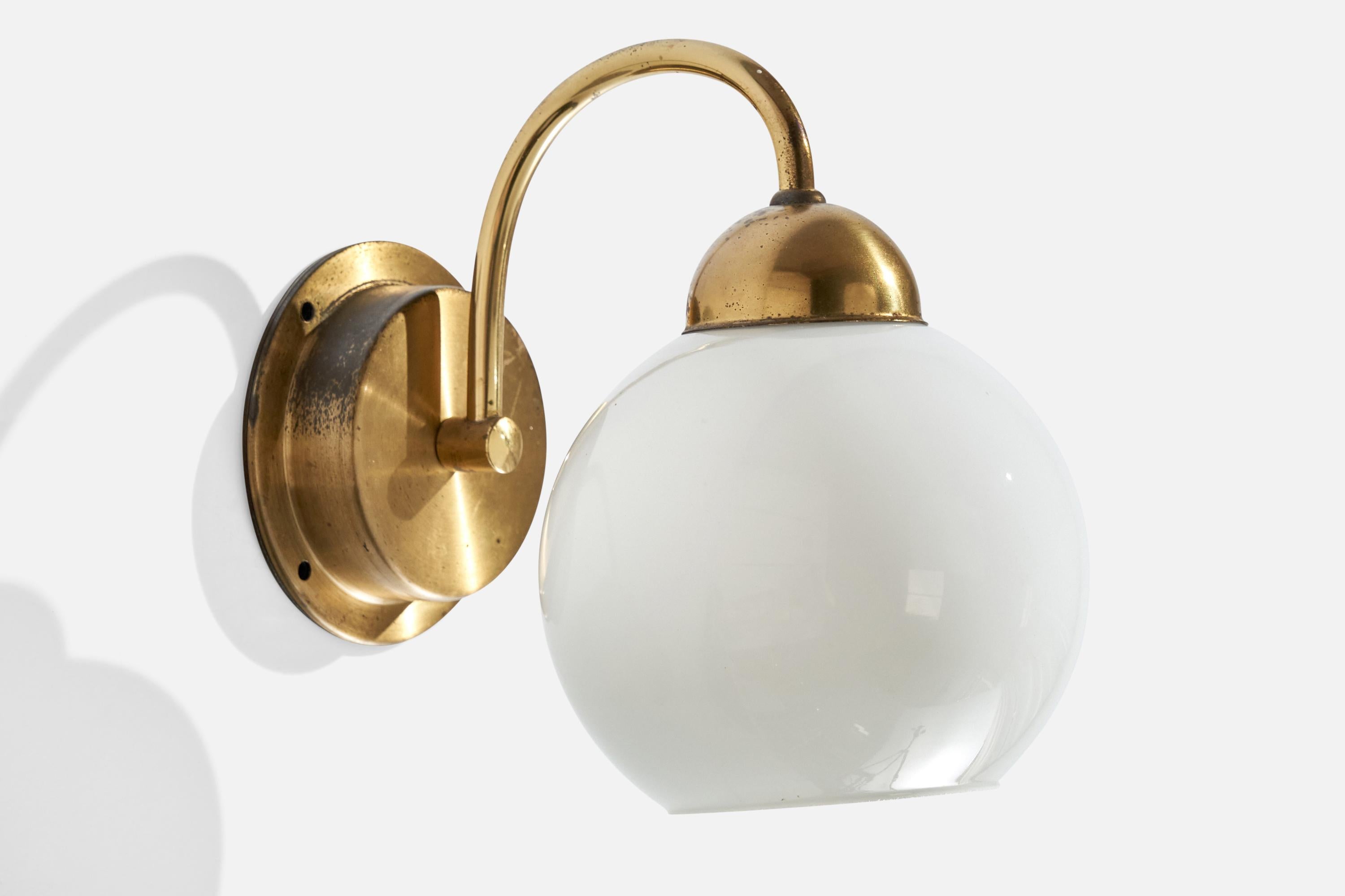 A brass and white opaline glass wall light designed and produced by EWÅ Värnamo, Sweden, 1970s.

Dramatic oxidation to black plate as illustrated.

Overall Dimensions (inches):  7.75” H x  5.5” W x 8.75 “D

Back Plate Dimensions (Inches): 4.25 ” H x