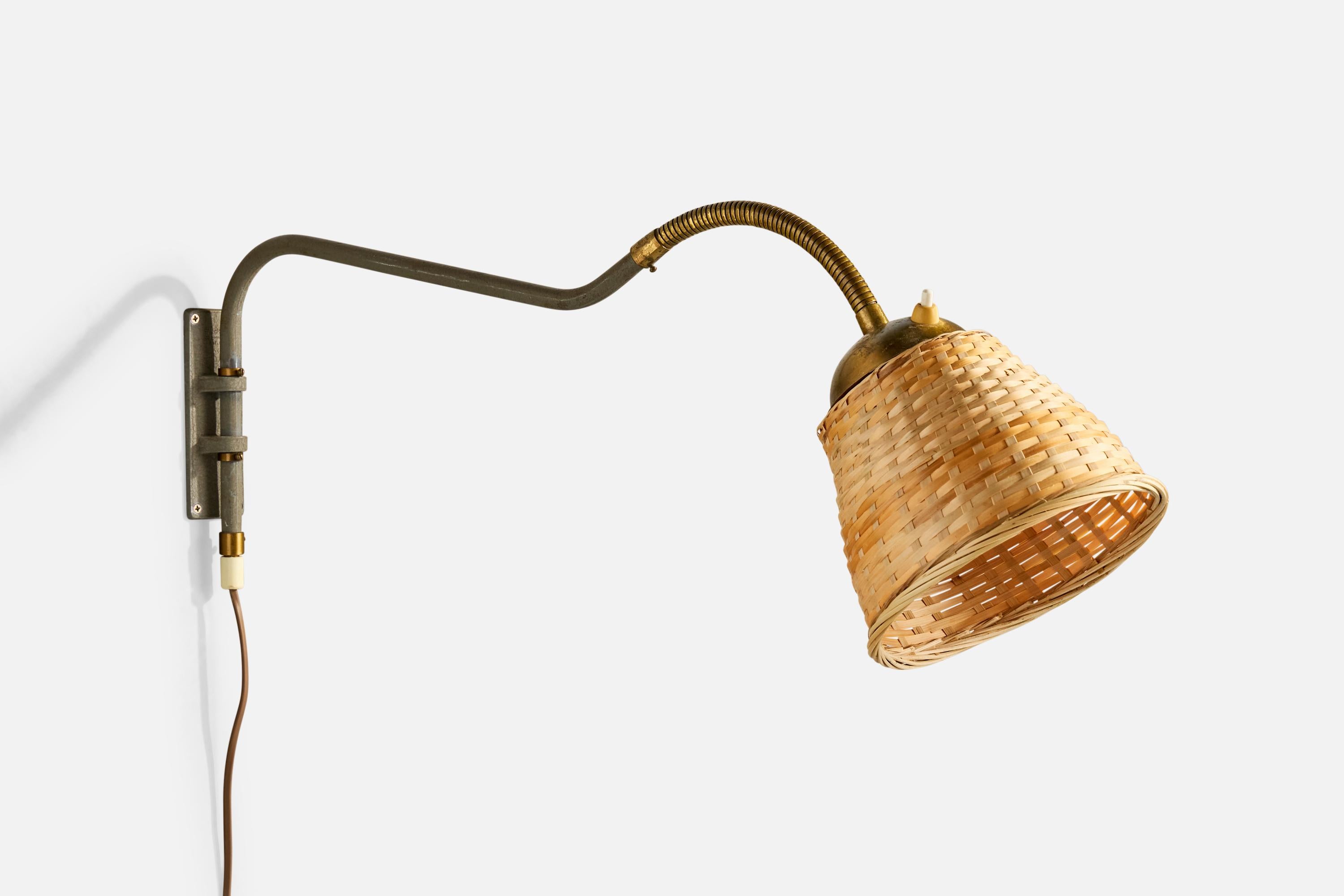 An adjustable grey-painted iron, brass and rattan wall light produced by EWÅ Värnamo, Sweden, c. 1950s.

Overall Dimensions (Inches): 7.5” H x 7” W x 27“ D (measured as shown)

Back Plate Dimensions (Inches): 5.25” H x 1.9“ W x 1.25” D

Bulb