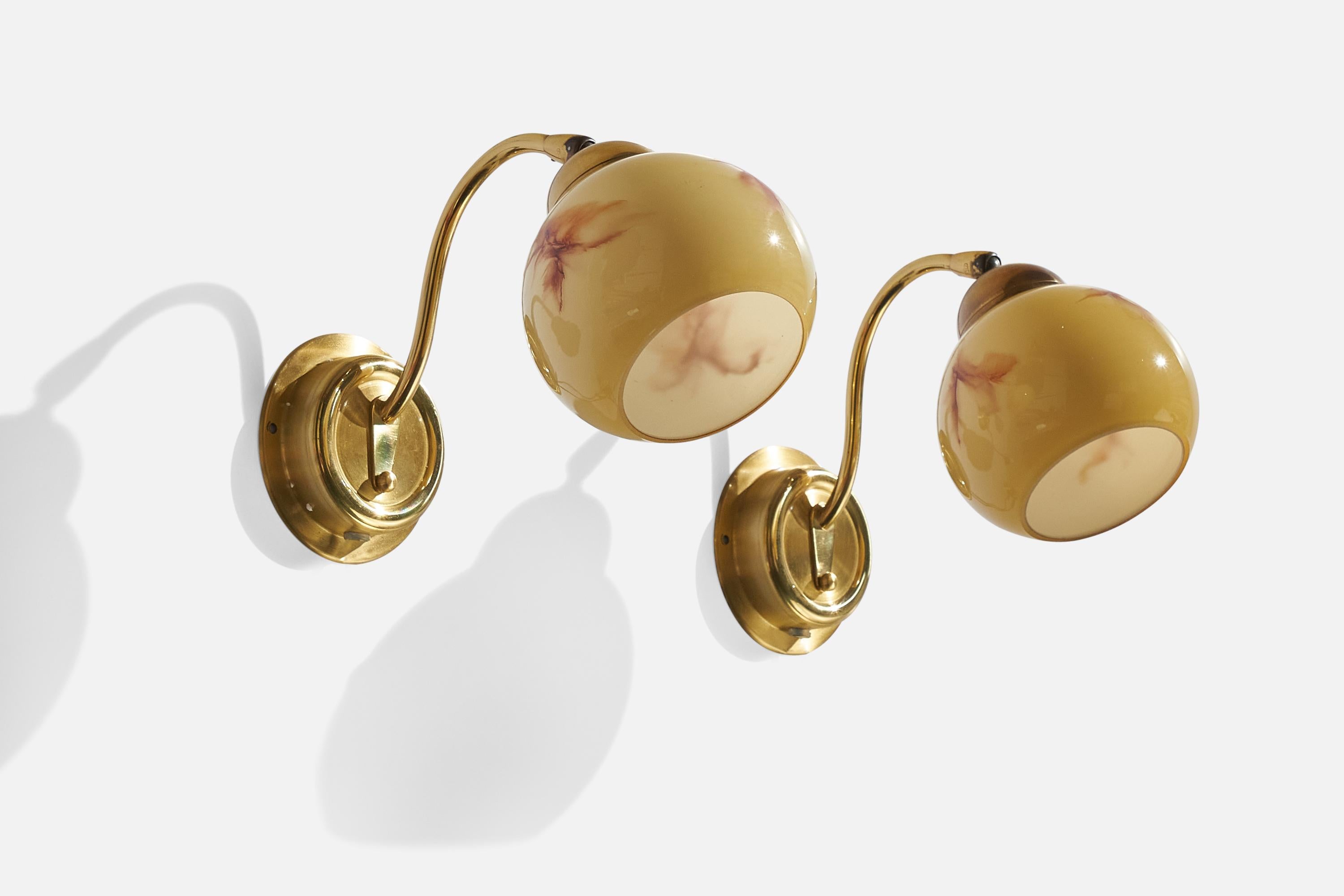 A pair of brass and beige glass wall lights designed and produced by EWÅ Värnamo, Sweden, 1970s.

Overall Dimensions (inches): 6.5”  H x 5” W x 8.5”  D
Back Plate Dimensions (inches): 4.25”  H x 1.1” D
Bulb Specifications: E-26 Bulb
Number of
