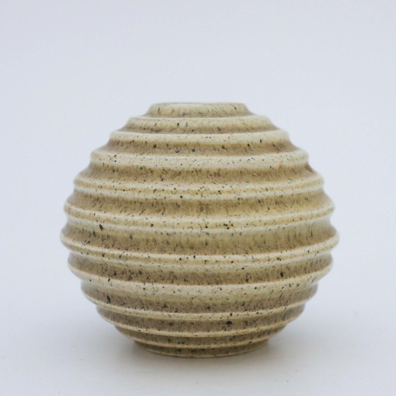 A globose vase designed by Ewald Dahlskog at Bo Fajans in Gefle in the 1930s. This vases was first presented at the Stockholm exhibition in 1930, that was the start for the functionalism. The vase has a lovely glaze that is called turquoise. The