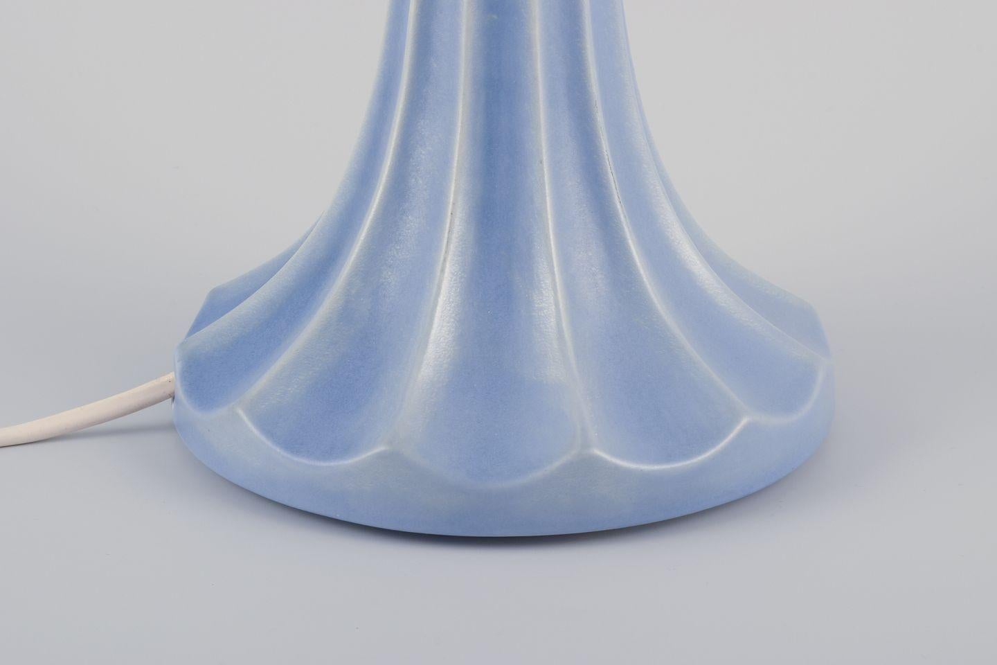 PRE-OWNED GOODS ARE EXEMPT FROM IMPORT TARIFFS FOR U.S., UK, AUSTRALIAN & CANADIAN CUSTOMERS.   
THEREFORE, NO IMPORT TARIFFS WILL BE APPLICABLE TO YOUR PURCHASE. 

Ewald Dahlskog (1894-1950) for Bo Fajans, Gefle, Sweden.
Art Deco table lamp in