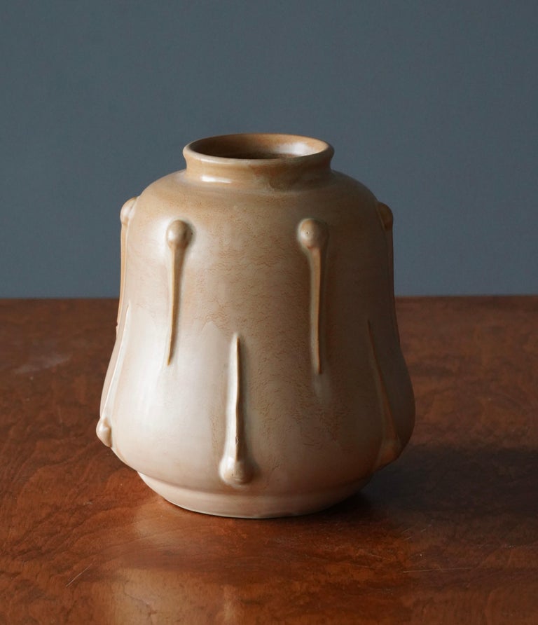 A vase. Designed by Ewald Dahlskog, produced by Bo Fajans, Sweden, 1930s. 

Marked and intialed.