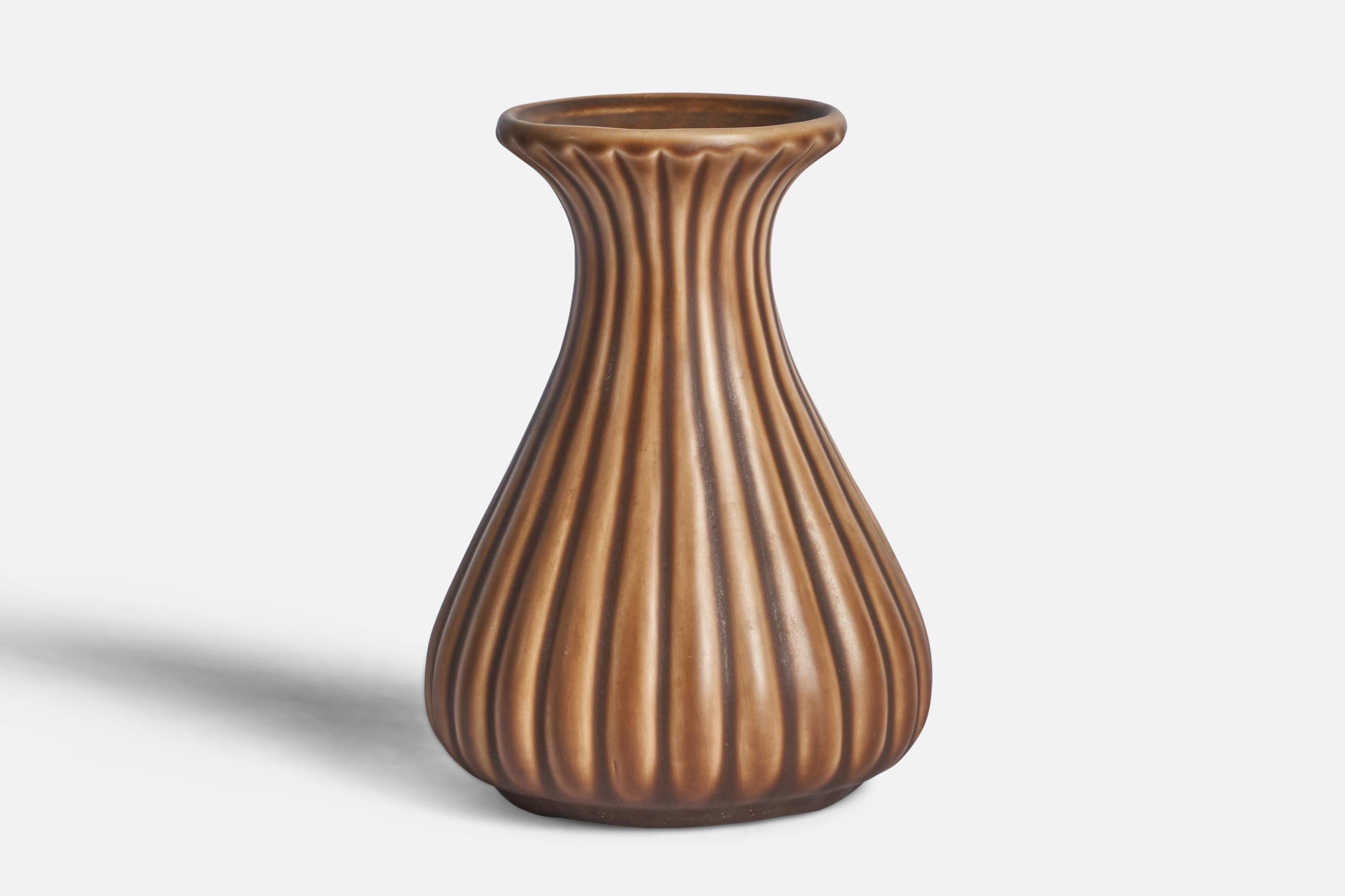 A fluted brown-glazed earthenware vase designed by Ewald Dahlskog and produced by Bo Fajans, Sweden, 1940s.