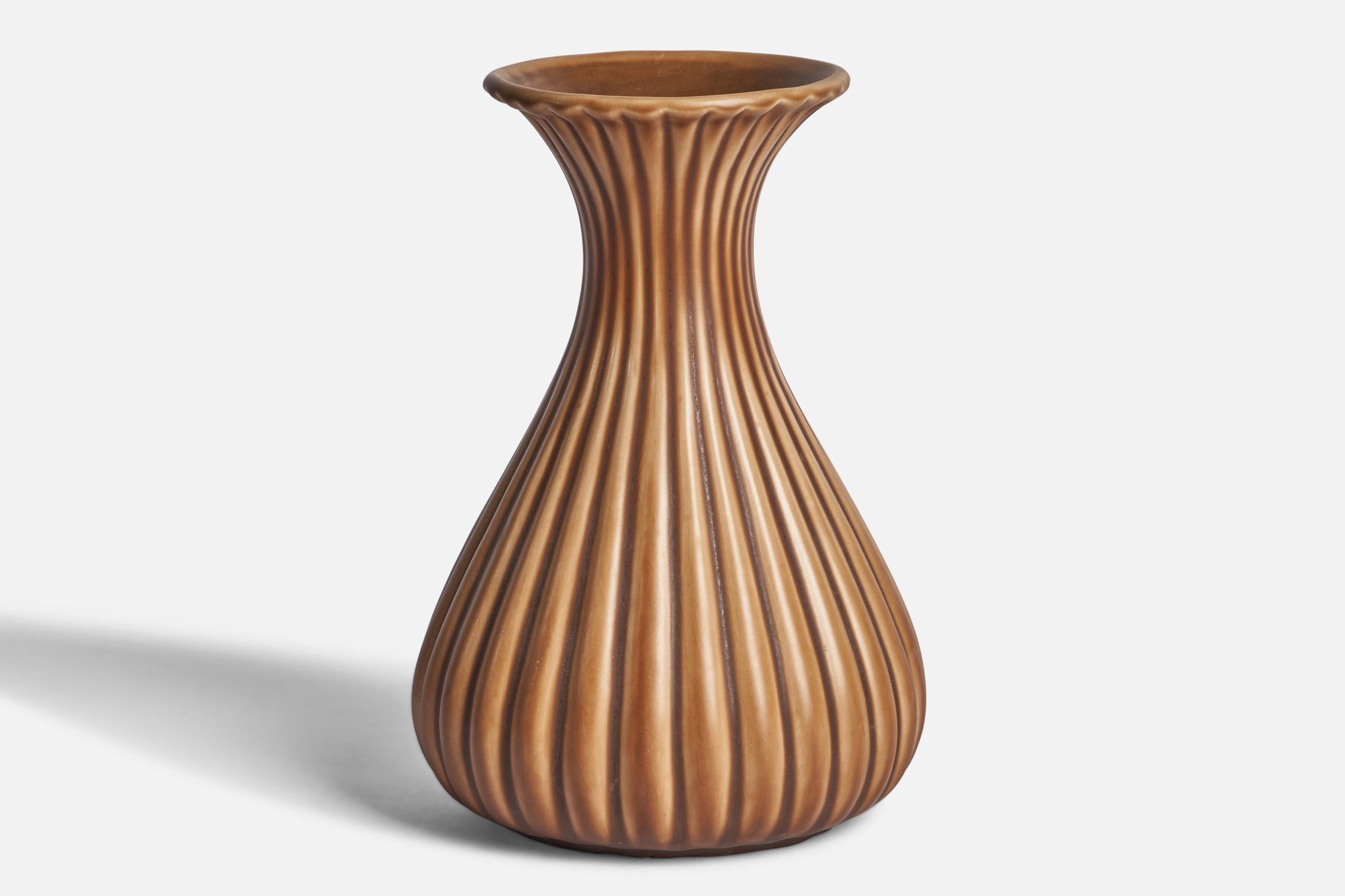 A brown-glazed fluted earthenware vase designed by Ewald Dahlskog and produced by Bo Fajans, Sweden, 1930s.