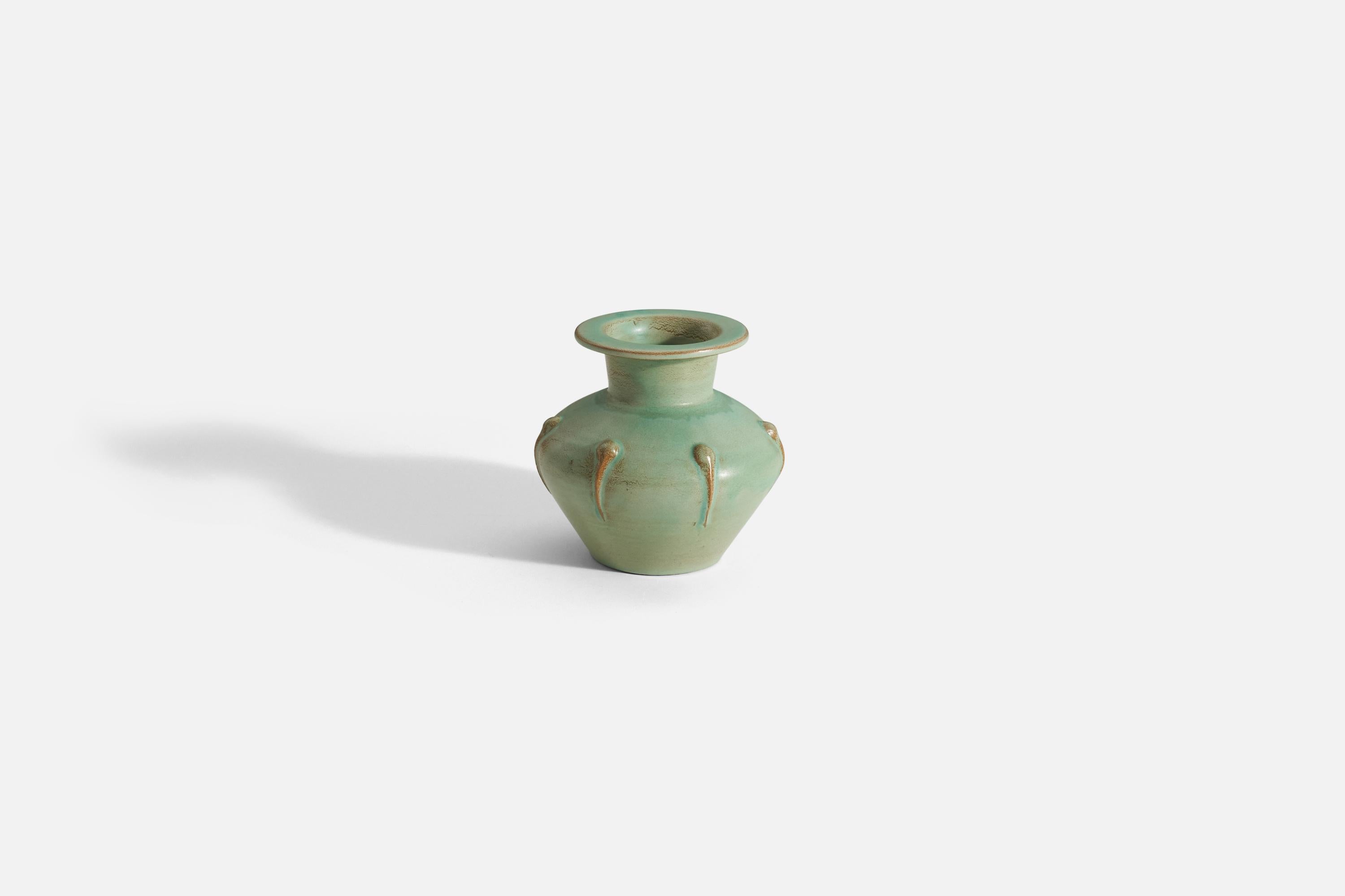 A green-glazed earthenware vase Designed by Ewald Dahlskog, produced by Bo Fajans, Sweden, 1930s. Stamped and signed to underside.