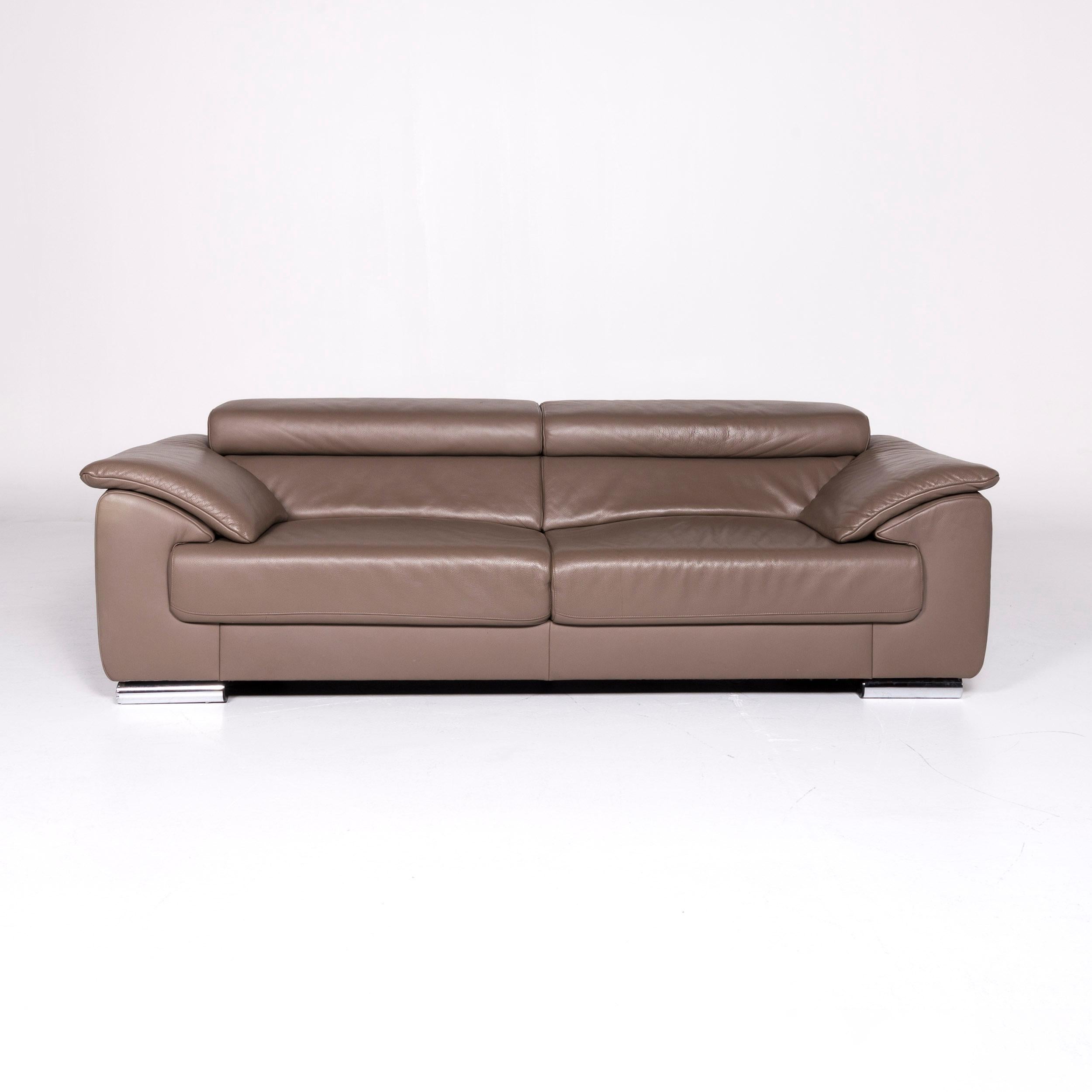 We bring to you a Ewald Schillig brand blues leather sofa brown three-seat.

Product measurements in centimeters:
 
Depth 103
Width 229
Height 72
Seat-height 40
Rest-height 60
Seat-depth 56
Seat-width 145
Back-height 32.
    