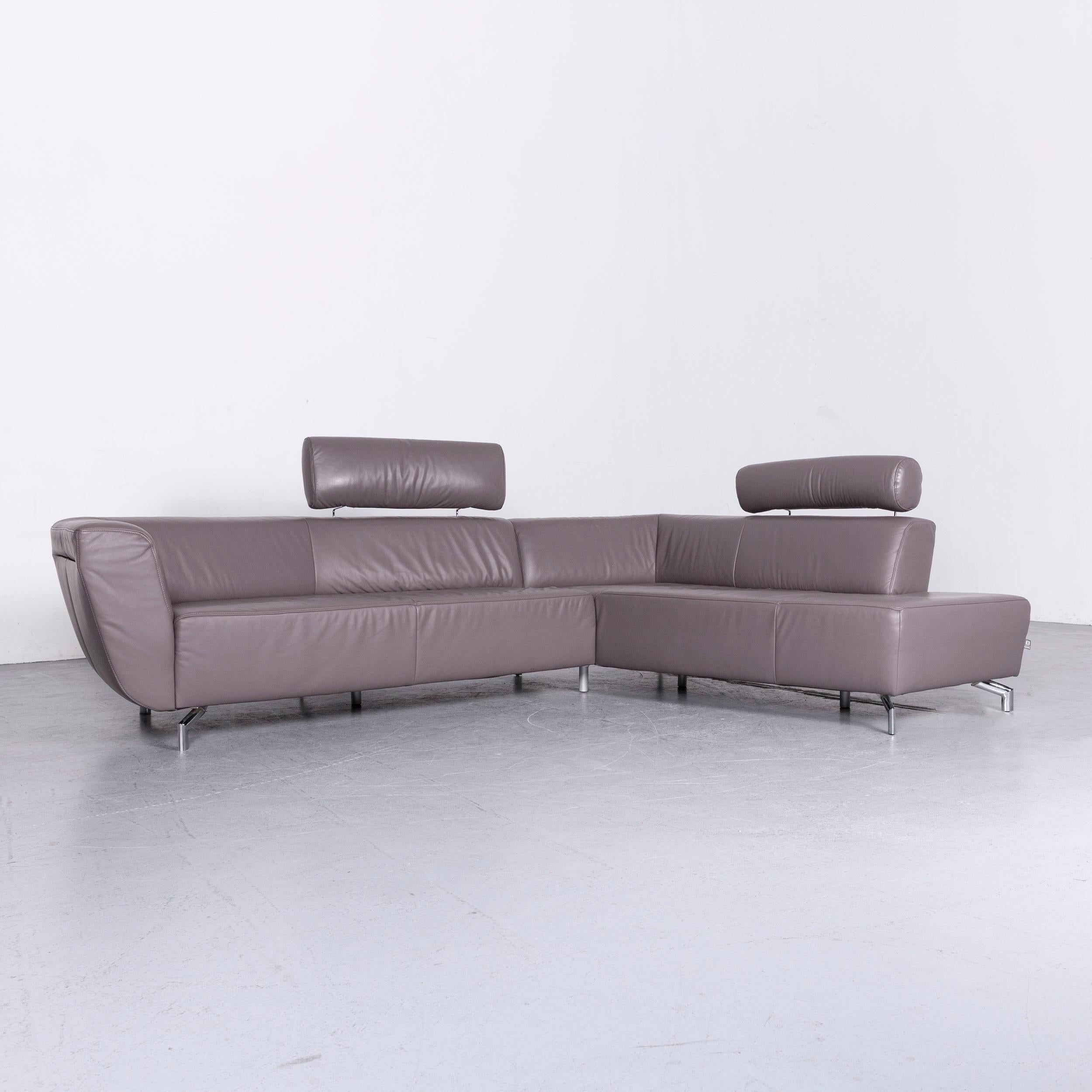 We bring to you an Ewald Schillig designer sofa leather grey corner couch.