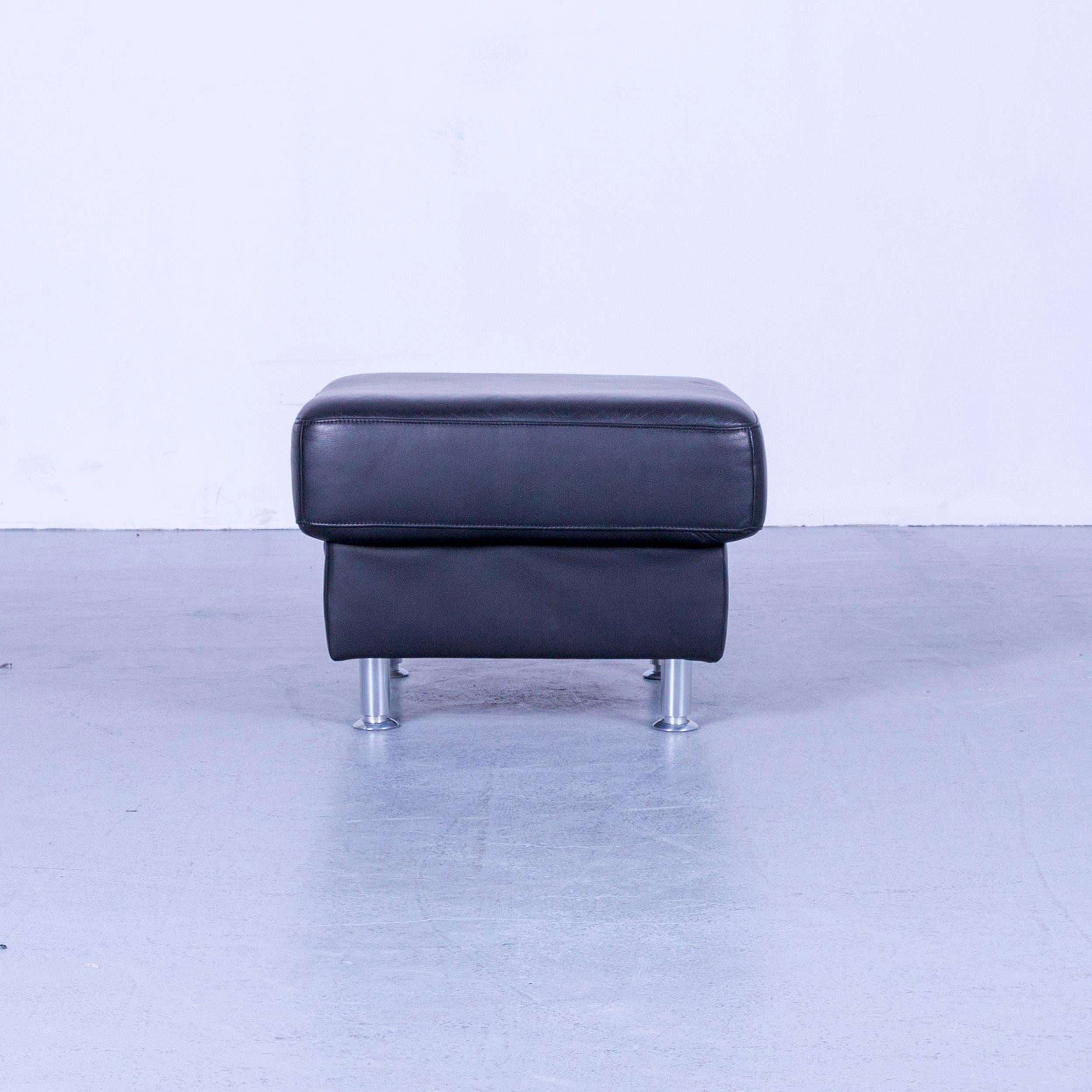 Ewald Schillig Florenz designer footrest black leather, in a minimalistic and modern design, made for pure comfort.