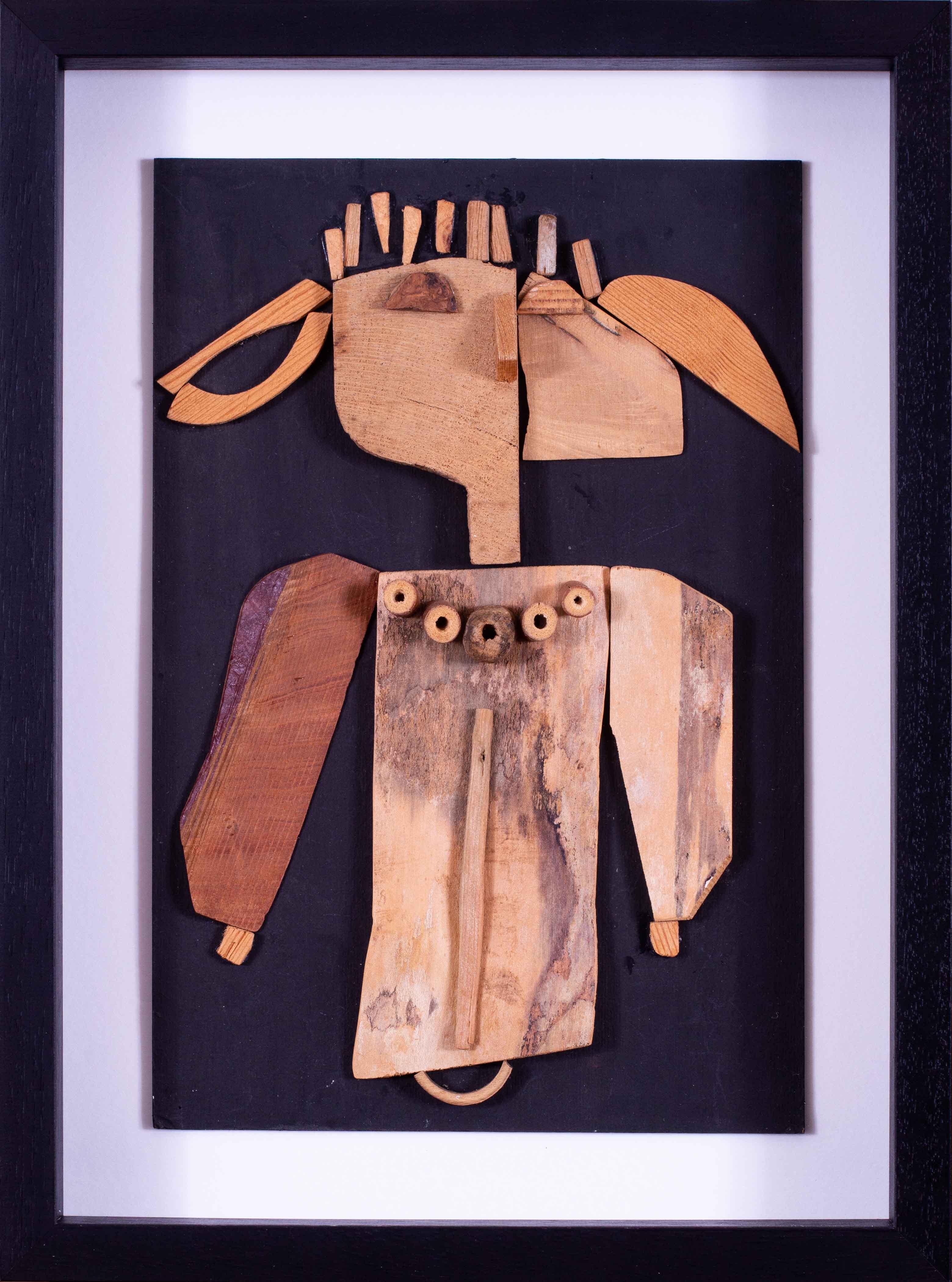 A very original and striking wood collage work by Modern British artist Ewart Johns

Ewart Johns (British, 1923 – 2013)
Forest Figure
Wood collage
Executed circa 2006
19 x 14.1/8 in. (48.3 x 36.3 cm.) Including frame

Ewart was born in Barry,