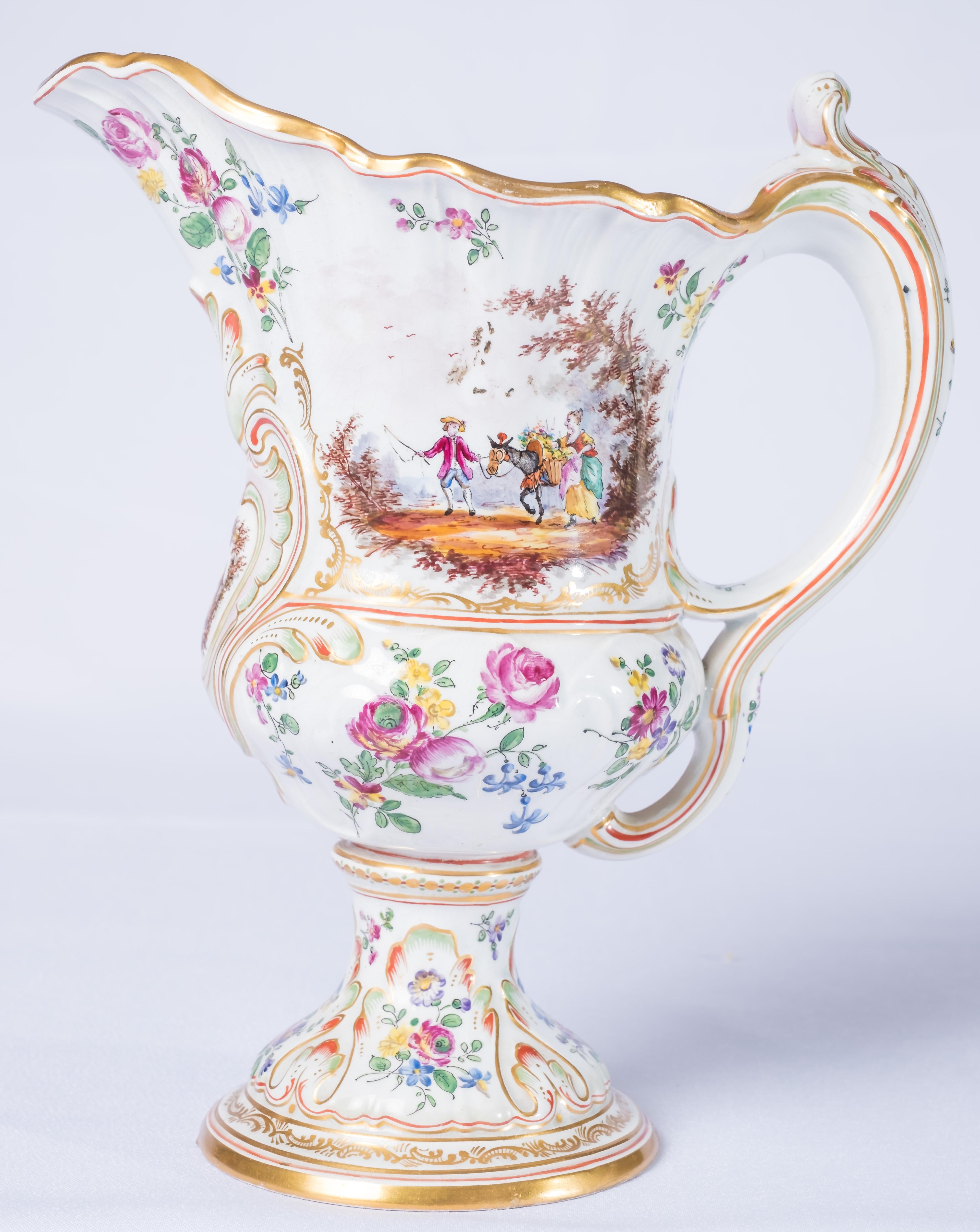 Water jug and basin 1767 Lille, North of France,
1767 Lille manufactory faience Washstand set hand painted with charming French Country side scene,
Decorated with a beautiful floral drawings and gold borders. Hand painted marked Lille 1767 with a