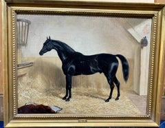 Portrait à l'huile victorien anglais du 19e siècle d'un cheval noir dans une écurie.