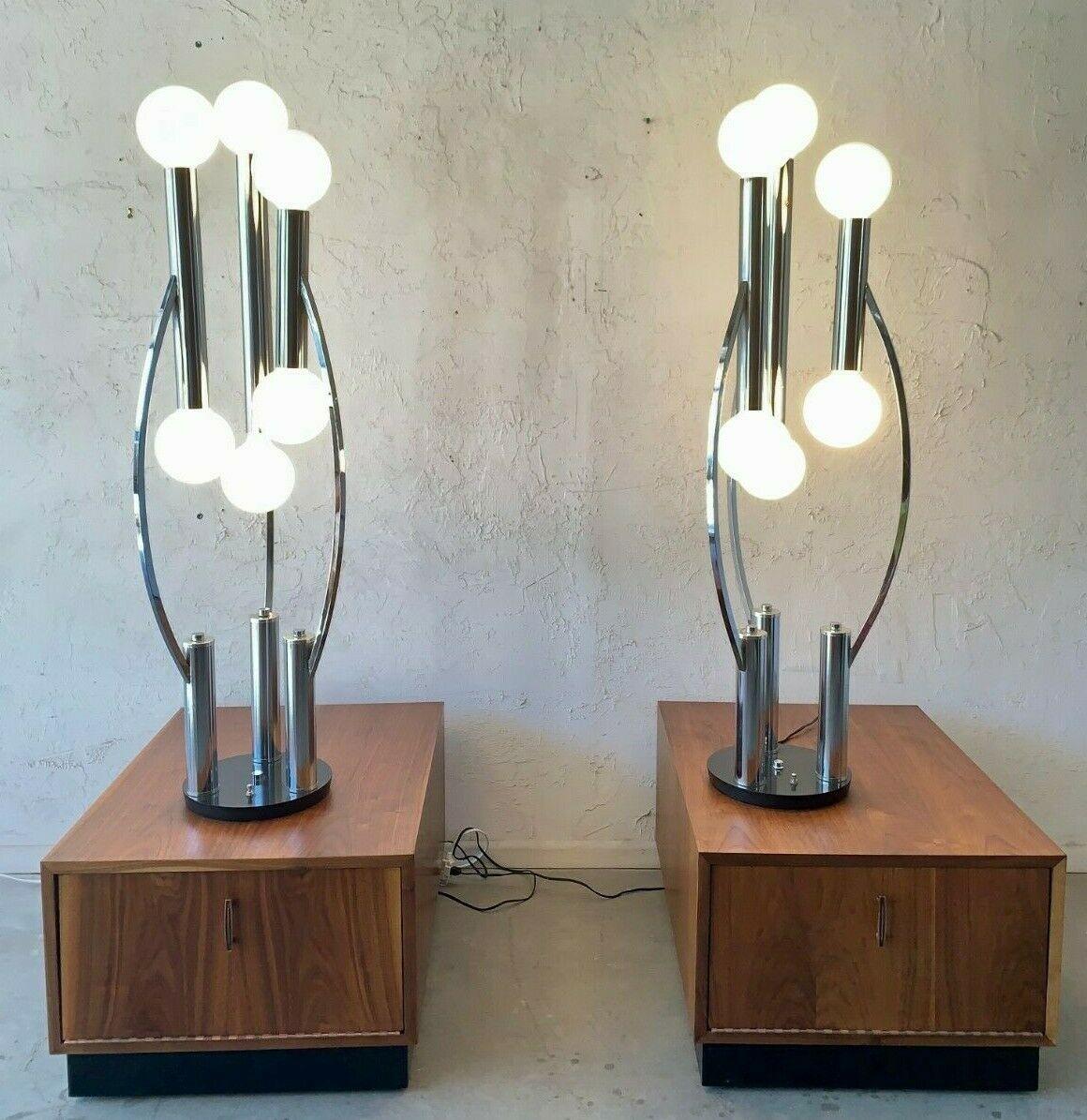 Large pair of 1970’s Space Age chrome lamps Sciolari style 

Very unique lamps. I have searched for a long time and have not found another. 

I believe they are Italian but they are not marked


With lightbulbs 48 inches high without