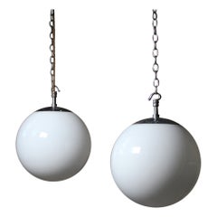 Ex RAF Mid 20th C Pair of Medium Chrome 
Opaline Globe Pendants Lights