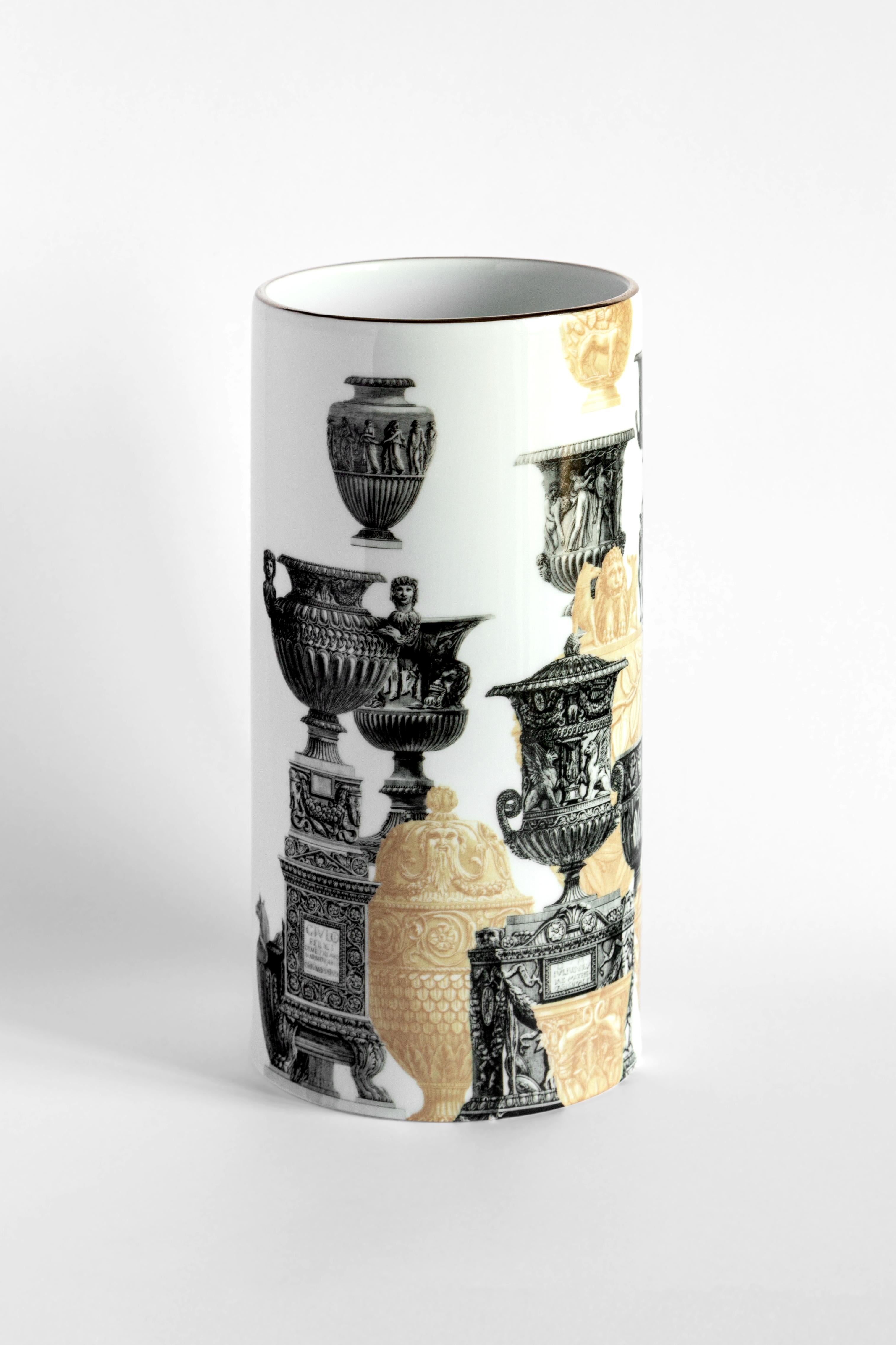 The cylindrical design of this porcelain vase is elevated and made unique by the application of a contemporary and unique decoration. This piece celebrates the eternal city of Rome through a meticulous and exquisite image of multiple ornamental