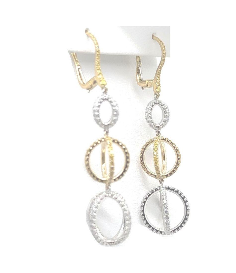 Orecchini a goccia tondi X graduati
Metallo: Platino e oro giallo 18 carati
Info sul diamante:
194 - Diamanti bianchi rotondi a brillante G-VS2 1,84 ctw.
130 - SI Rotondo Brillante Nature Giallo Intenso  Diamanti 1,33 ctw.
Dimensioni della sfera 9