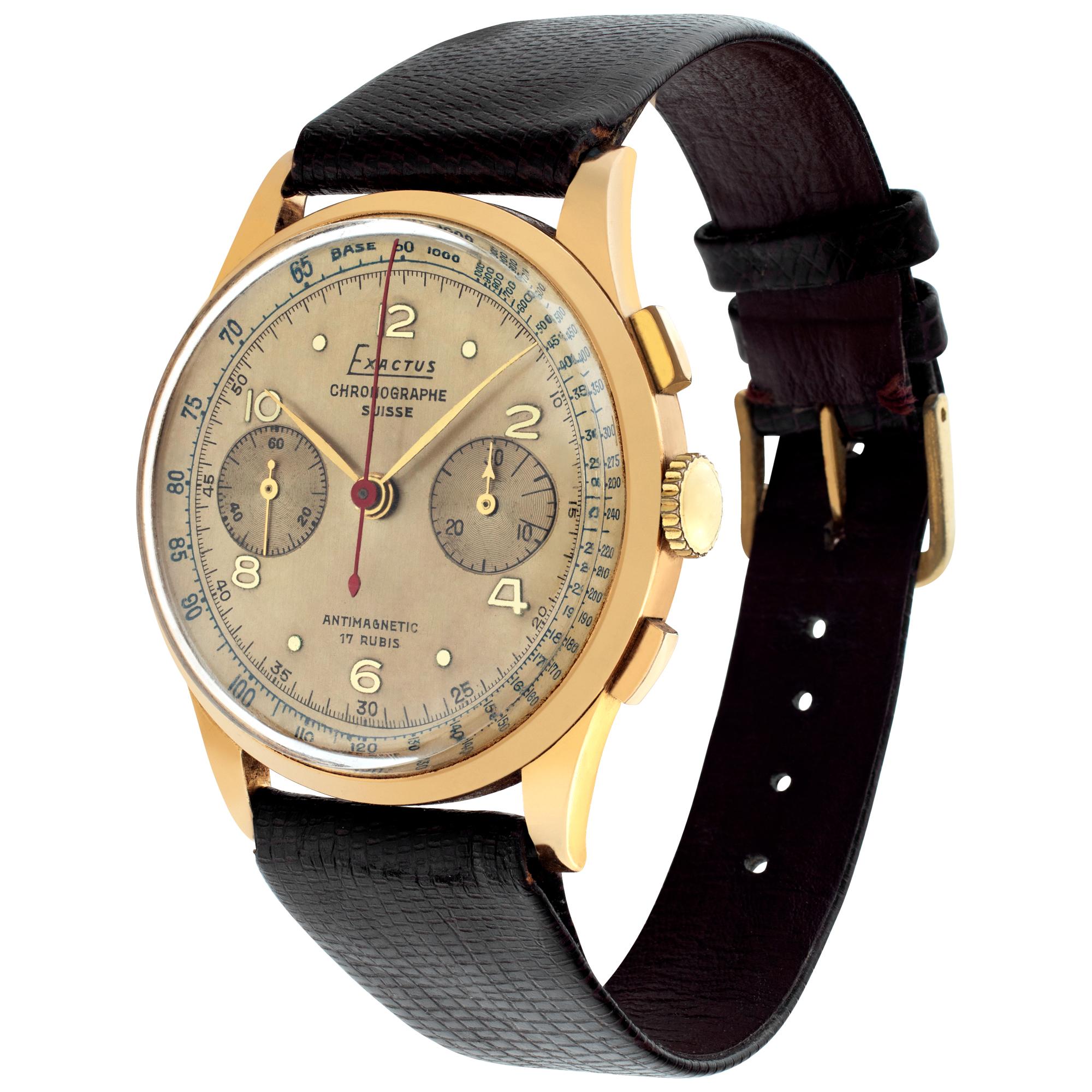 Vintage Exactus Chronograph in 18k on brown lizard strap with plaque tang buckle. Manual w/ subseconds and chronograph. 37 mm case size. Circa 1960s. Fine Pre-owned Exactus Watch. Certified preowned Vintage Exactus Chronograph watch is made out of