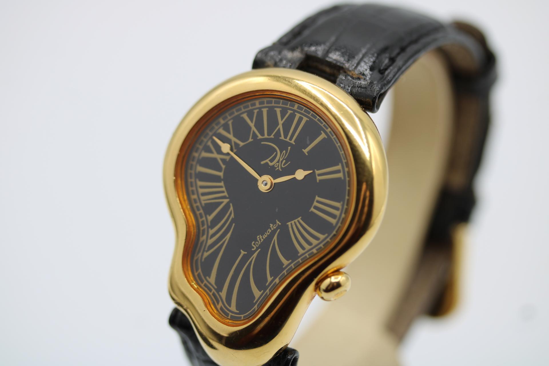 These Exaequo SoftWatch Salvador Dali's are a bit of quirky fun! We have had a few of these in over the last year.

This Softwatch Salvador Dali 121257 is different from many of the others due to its unique features,

This SoftWatch has an oblong