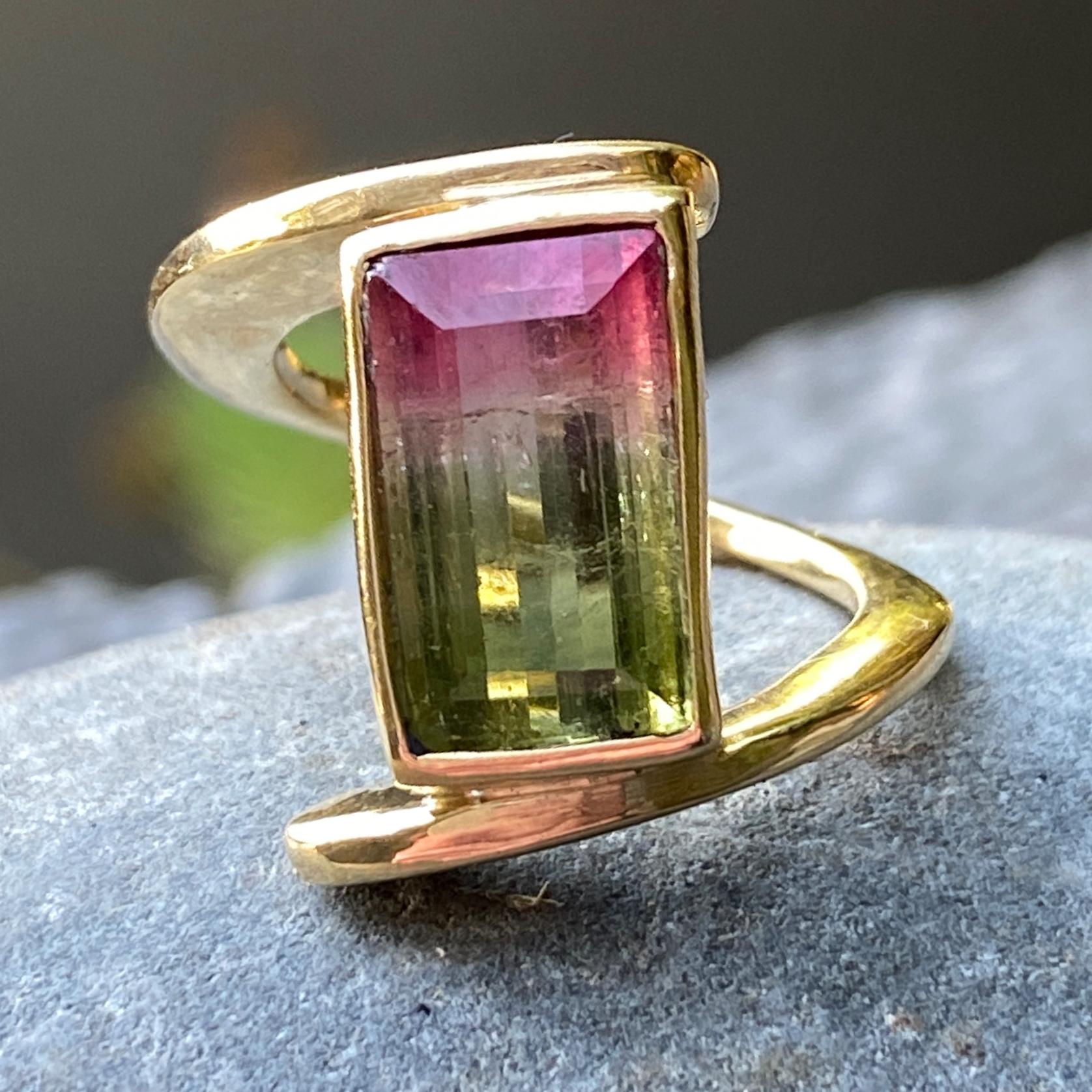 This unusual new ring by Eytan Brandes features a spiral stone-girding design he's used with many different gemstones.  This is a particularly dramatic version as it involves a huge spread to accommodate a delicious, vertically oriented watermelon
