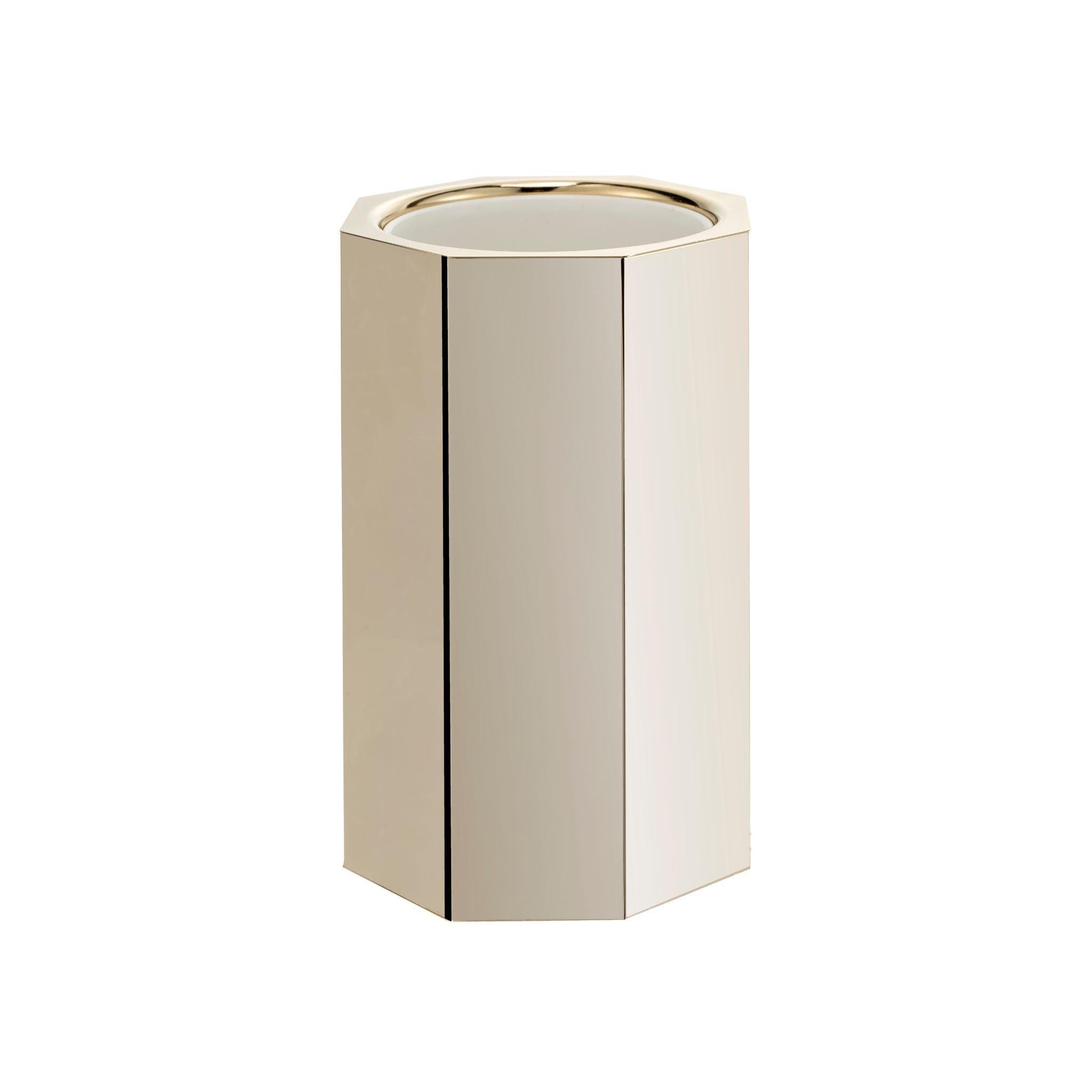 Add a touch of classic elegance to your home decor with our hexagonal brass glacette. Featuring a natural brass finish, its unique and stylish design is perfect for keeping drinks cold and adding sophistication to any space. Ideal for entertaining